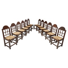 Set of Twelve Oak and Straw Dining Chairs with Geometric Backs, Spain ca 1930s