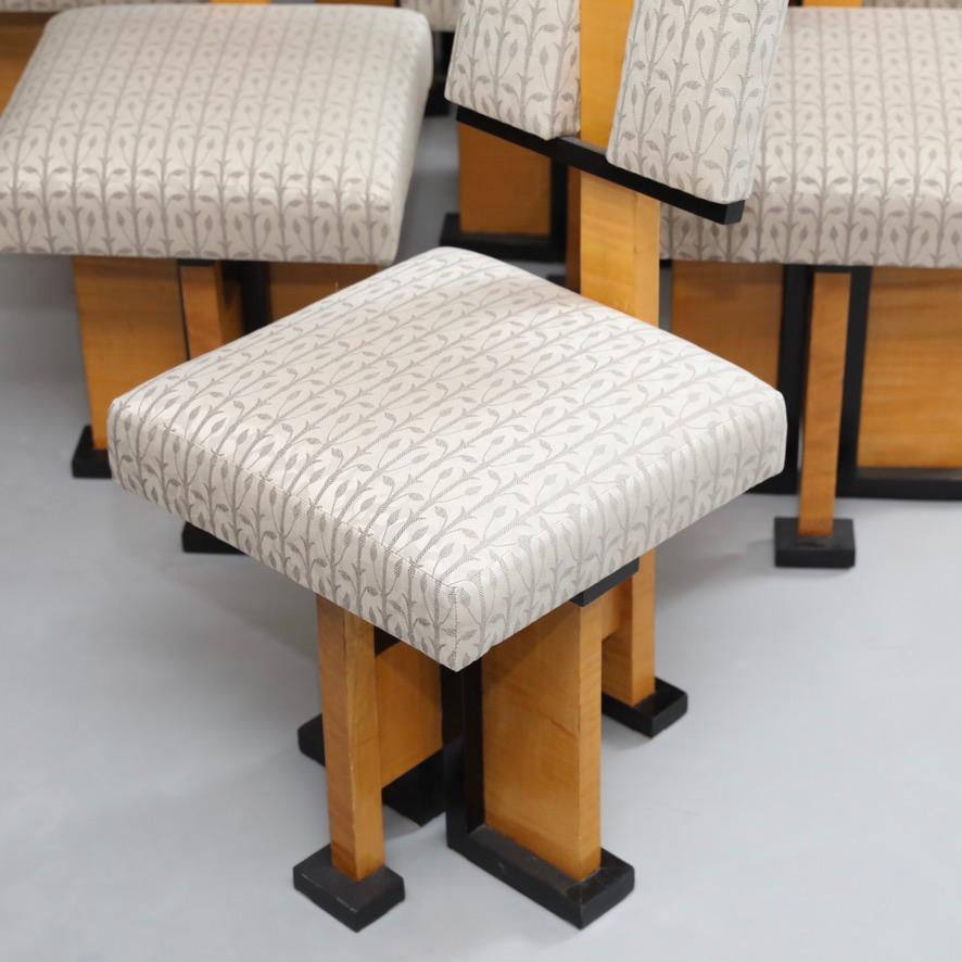 Set of Twelve Pivot-Back Dining Chairs 1