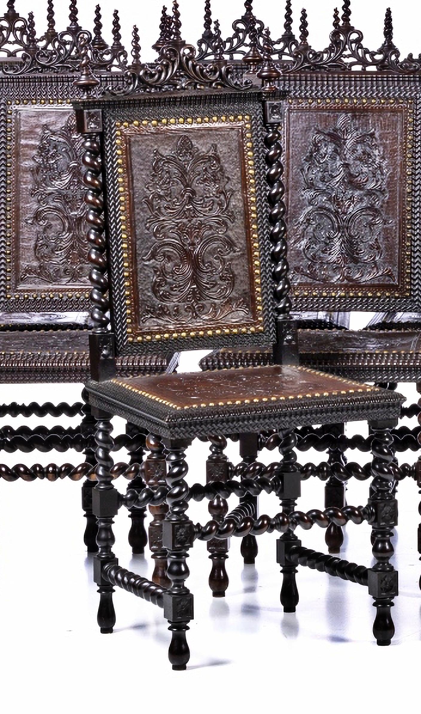 SET OF TWELVE PORTUGUESE CHAIRS

19th Century
in carved rosewood wood.
Seats in carved leather with pleats, roll-up arms, turned legs.
Small defects.
Dim.: 113 x 46 x 41 cm.
very good conditions
