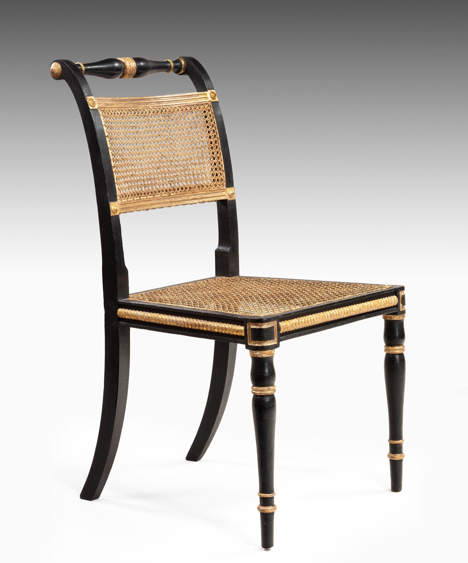 Set of Twelve Regency Dining Chairs in Ebonized and Gilded Decoration In Good Condition In London, GB