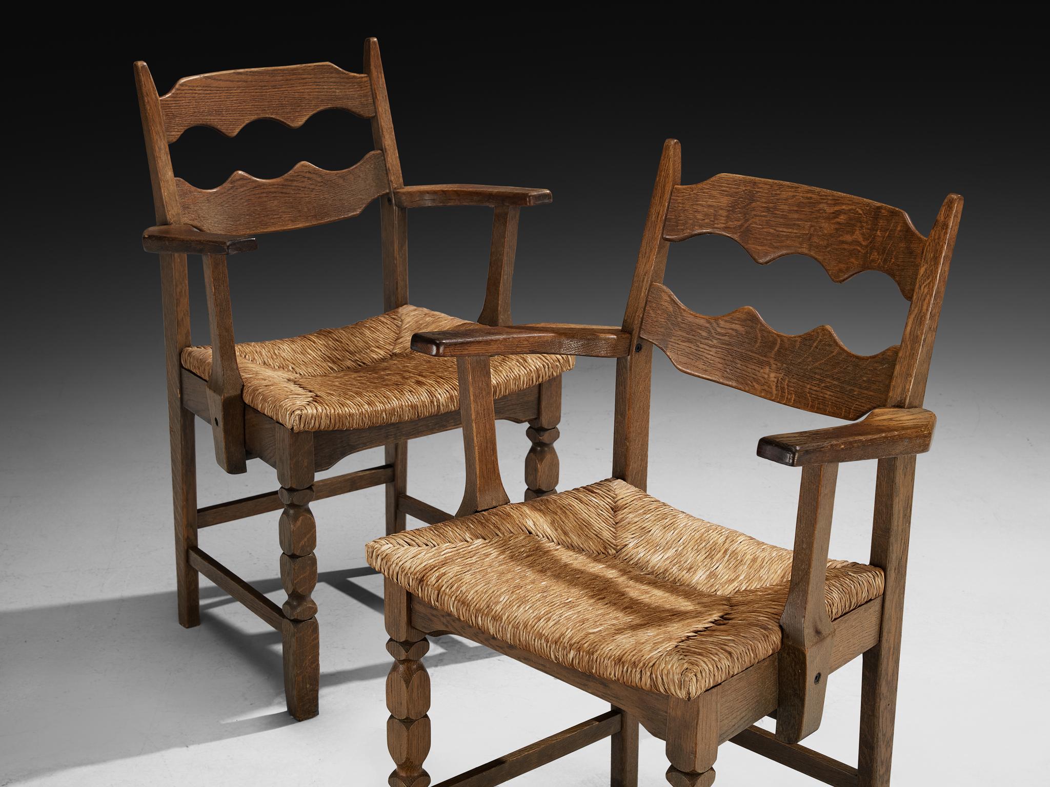 Mid-Century Modern Set of Twelve Rustic Mid-Century Carved Armchairs in Oak and Straw For Sale