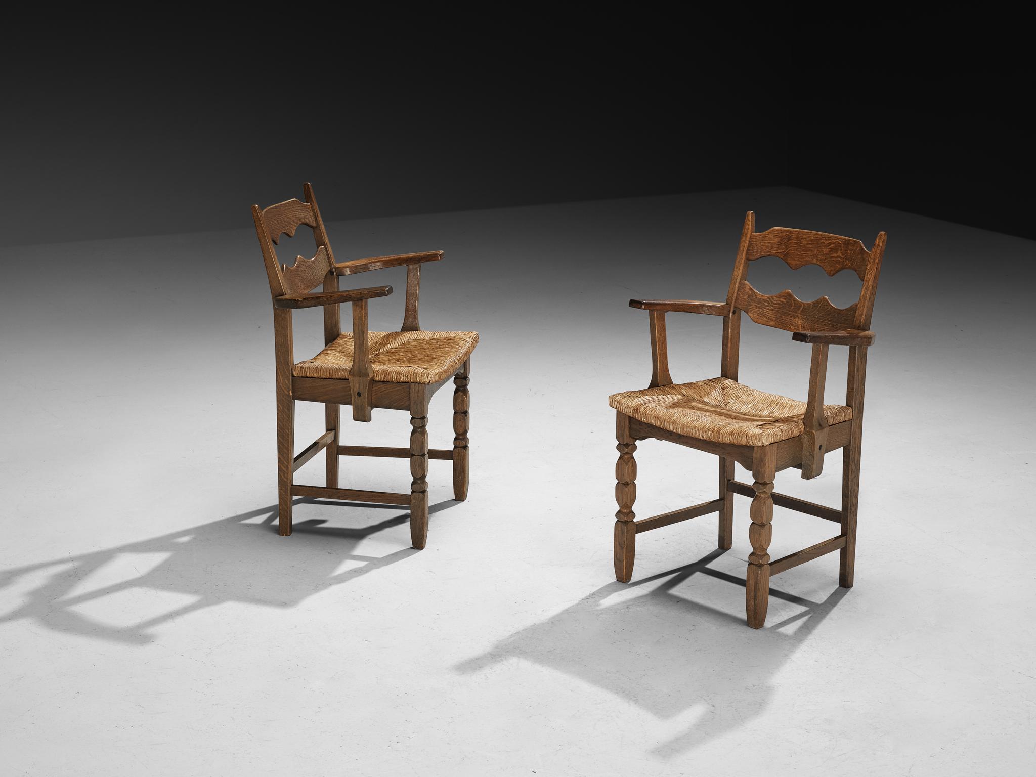 European Set of Twelve Rustic Mid-Century Carved Armchairs in Oak and Straw For Sale