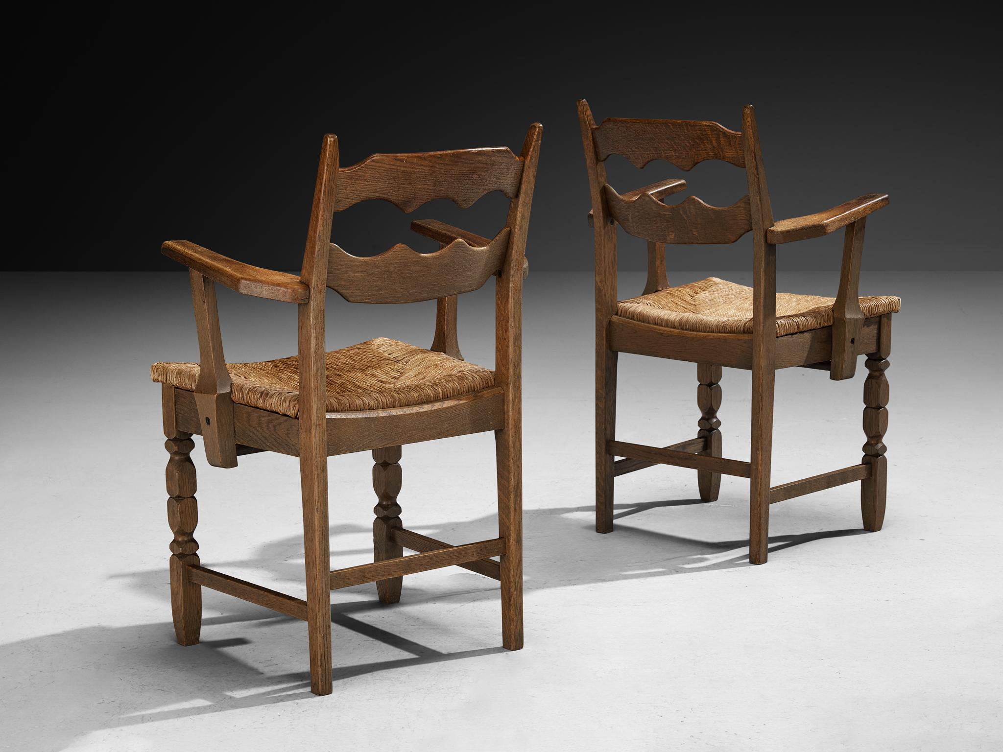 Mid-20th Century Set of Twelve Rustic Mid-Century Carved Armchairs in Oak and Straw For Sale