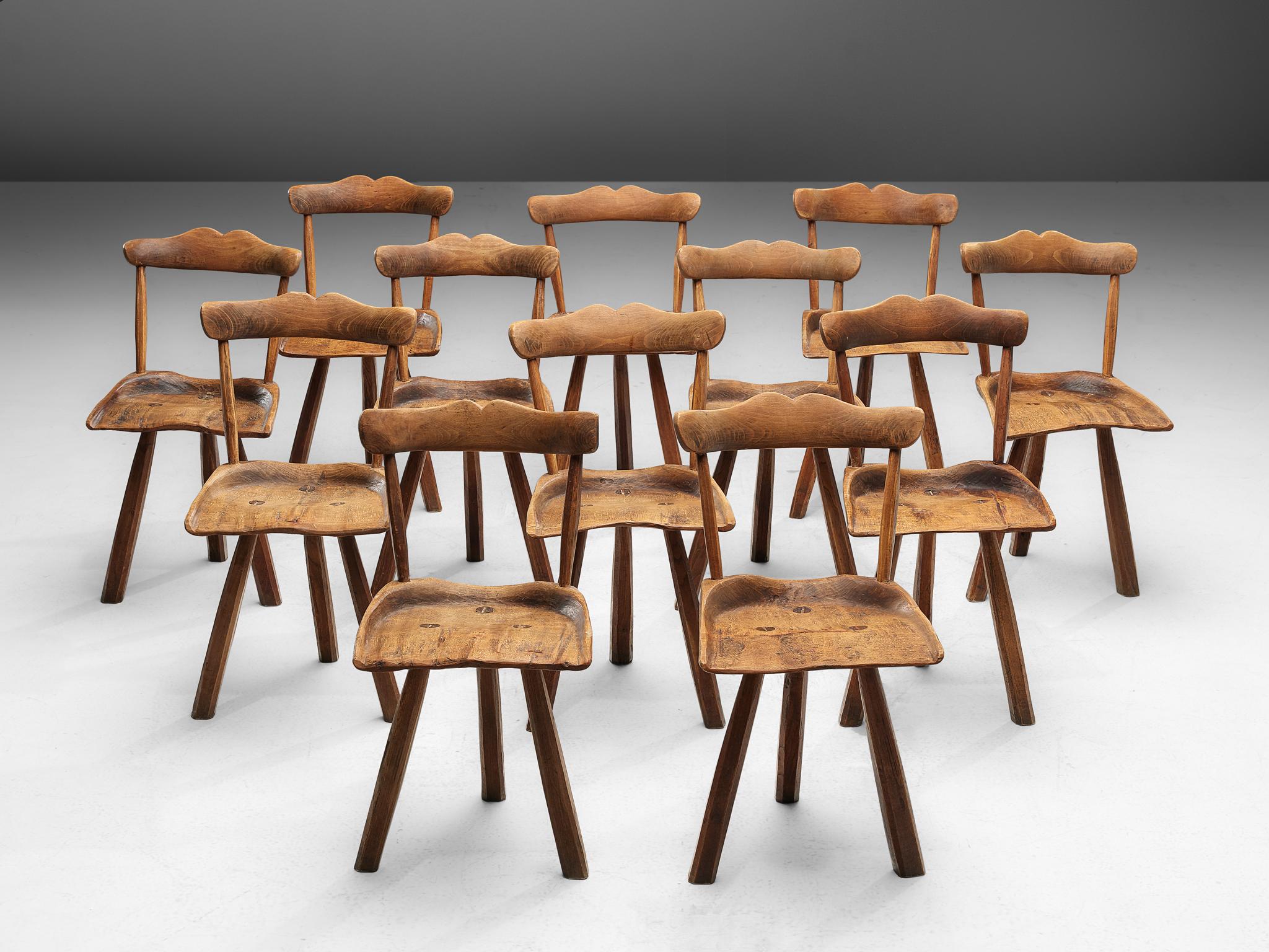 European Set of Twelve Rustic Tripod Dining Chairs