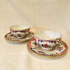 Set of Twelve Samson Quatrefoil Cups and Saucers with Different Coats of Arms
