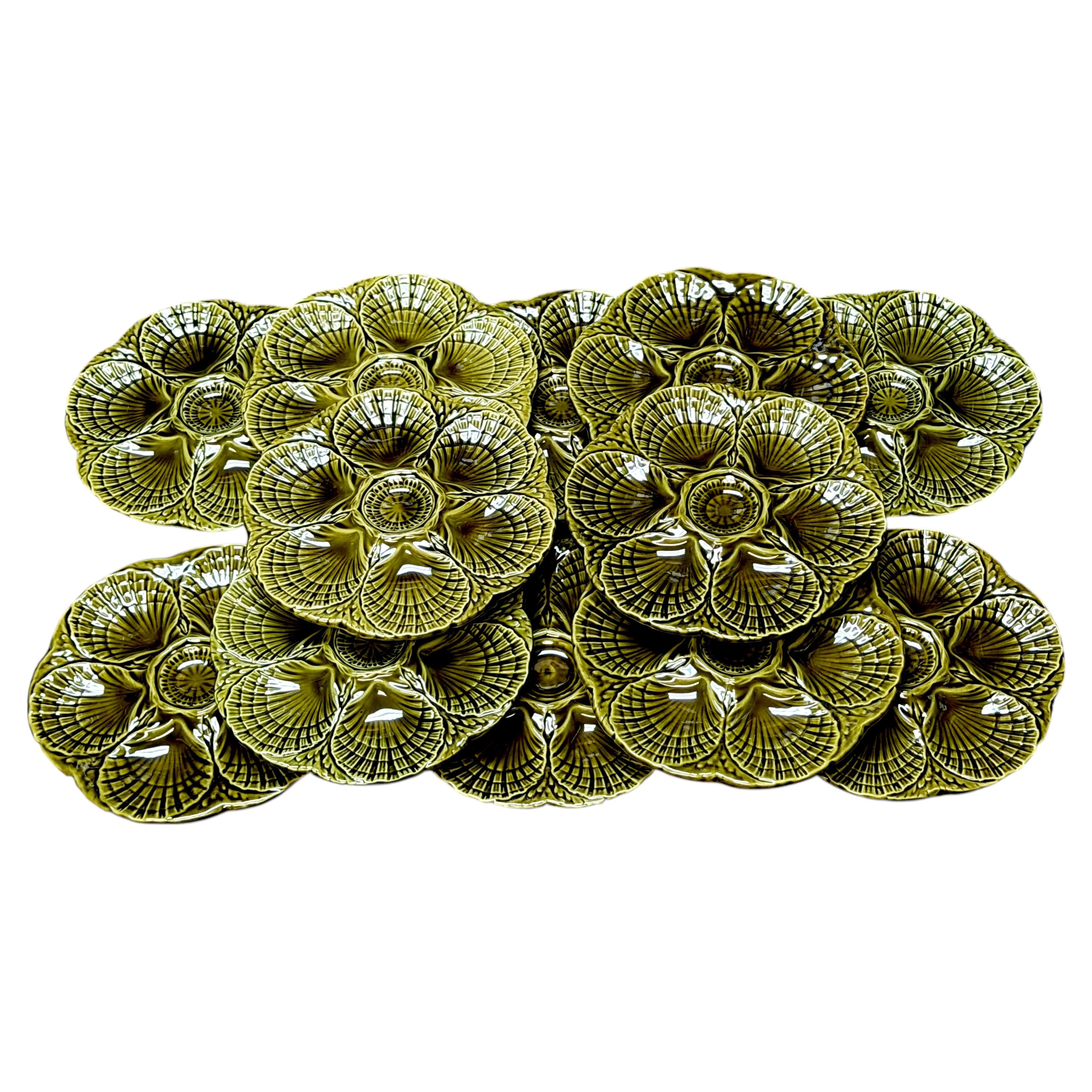 Set of Twelve Sarreguemines Olive Green French Majolica Oyster Plates For Sale