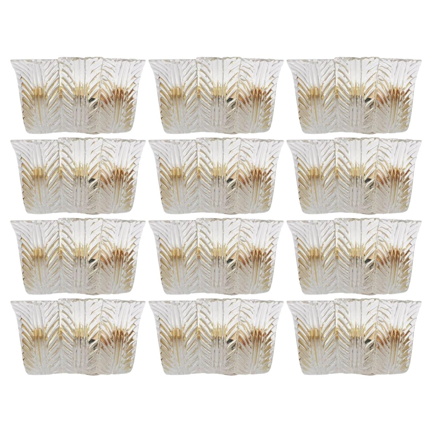 Conjunto de doce apliques con hojas de cristal de Murano transparente de Maria Maggi. Italia Años 90