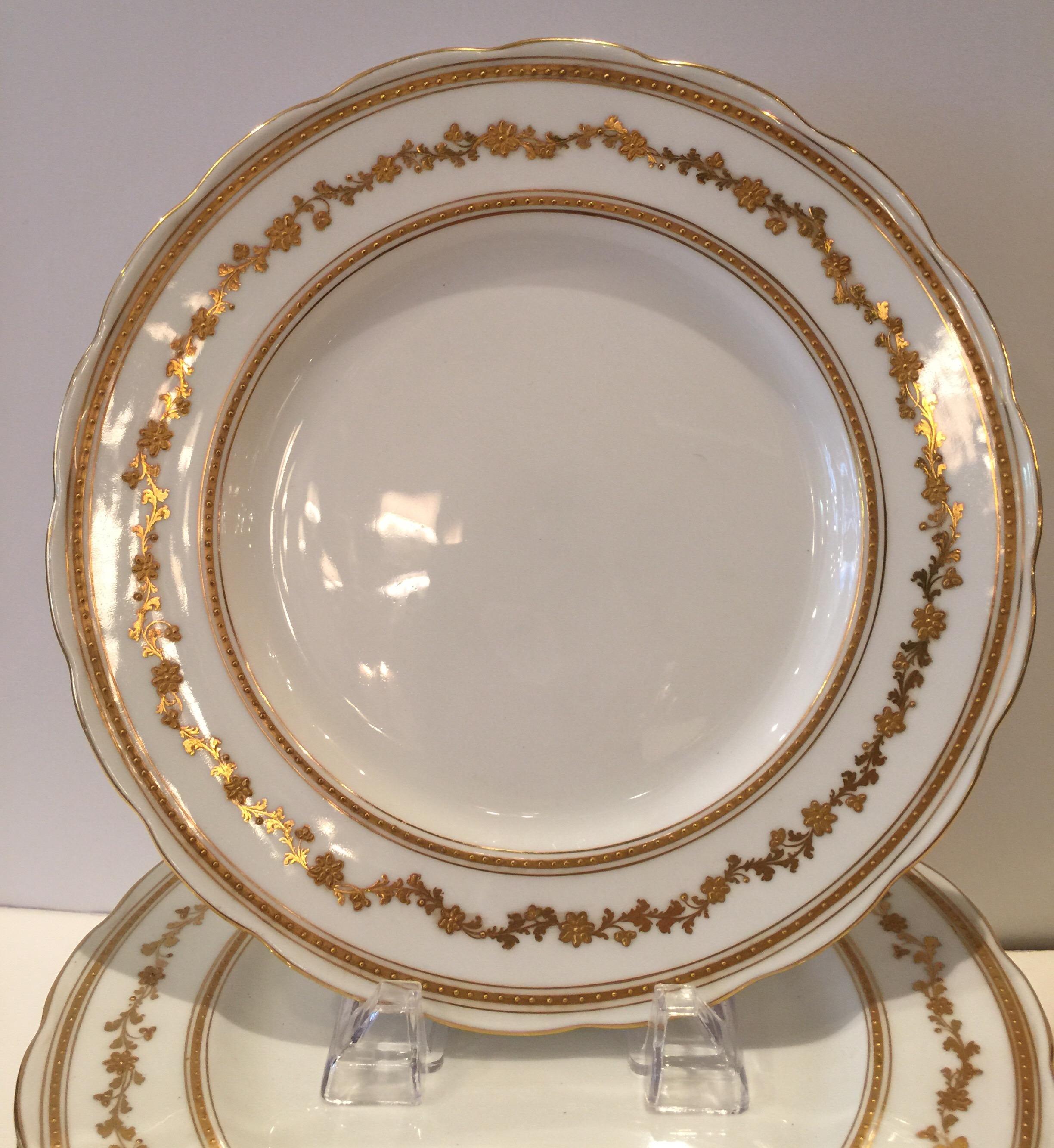 Set of twelve service/dinner plates made in England for Ovington Brothers
Dimensions: 10.5 inches.