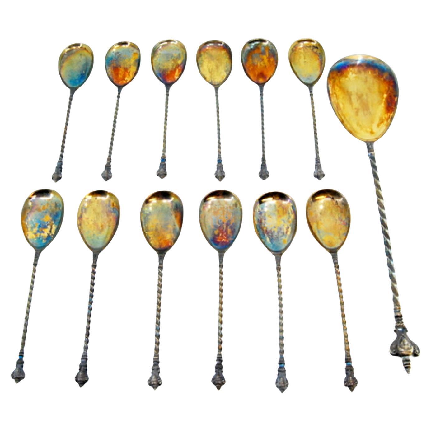 Set of twelve silver ice cream scoops
ladle w/ twisted handles
appliqués