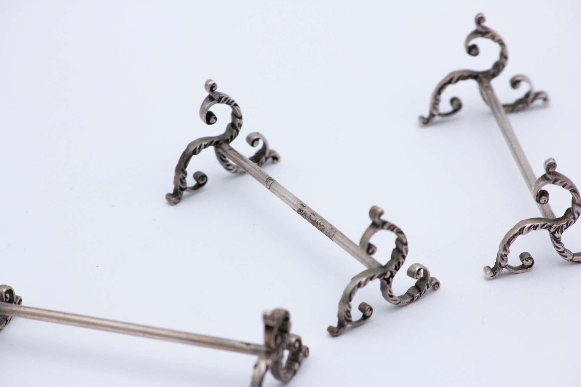 Set of twelve silver knife rests (Europäisch) im Angebot