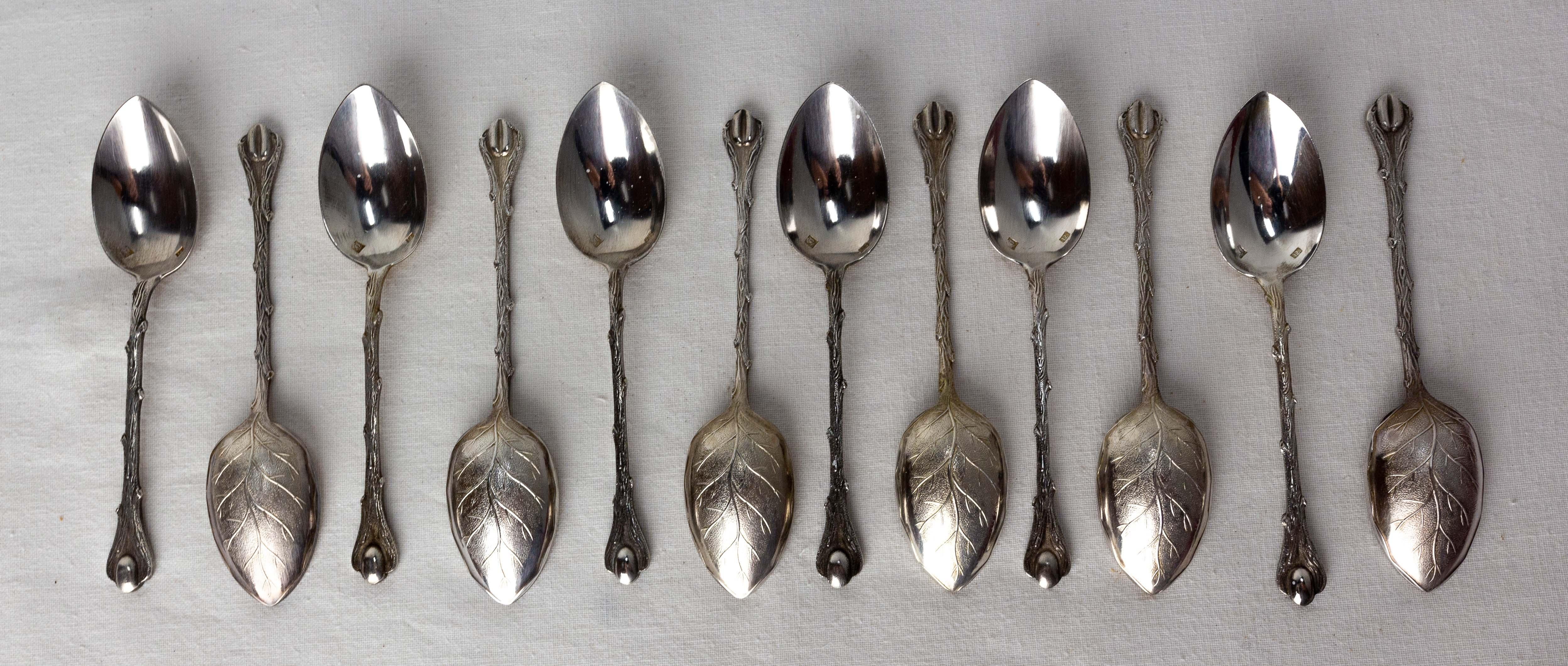 French silver metal set of twelve spoons
The back of each spoon represents a very well executed leaf whose details are seen as the ribs. The handles of the spoons are carved like twigs of branches.
Finally to remind the use of these mocha spoons a