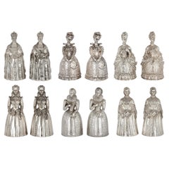 Set of twelve silver-plated bronze Queen hand bells by Gorham