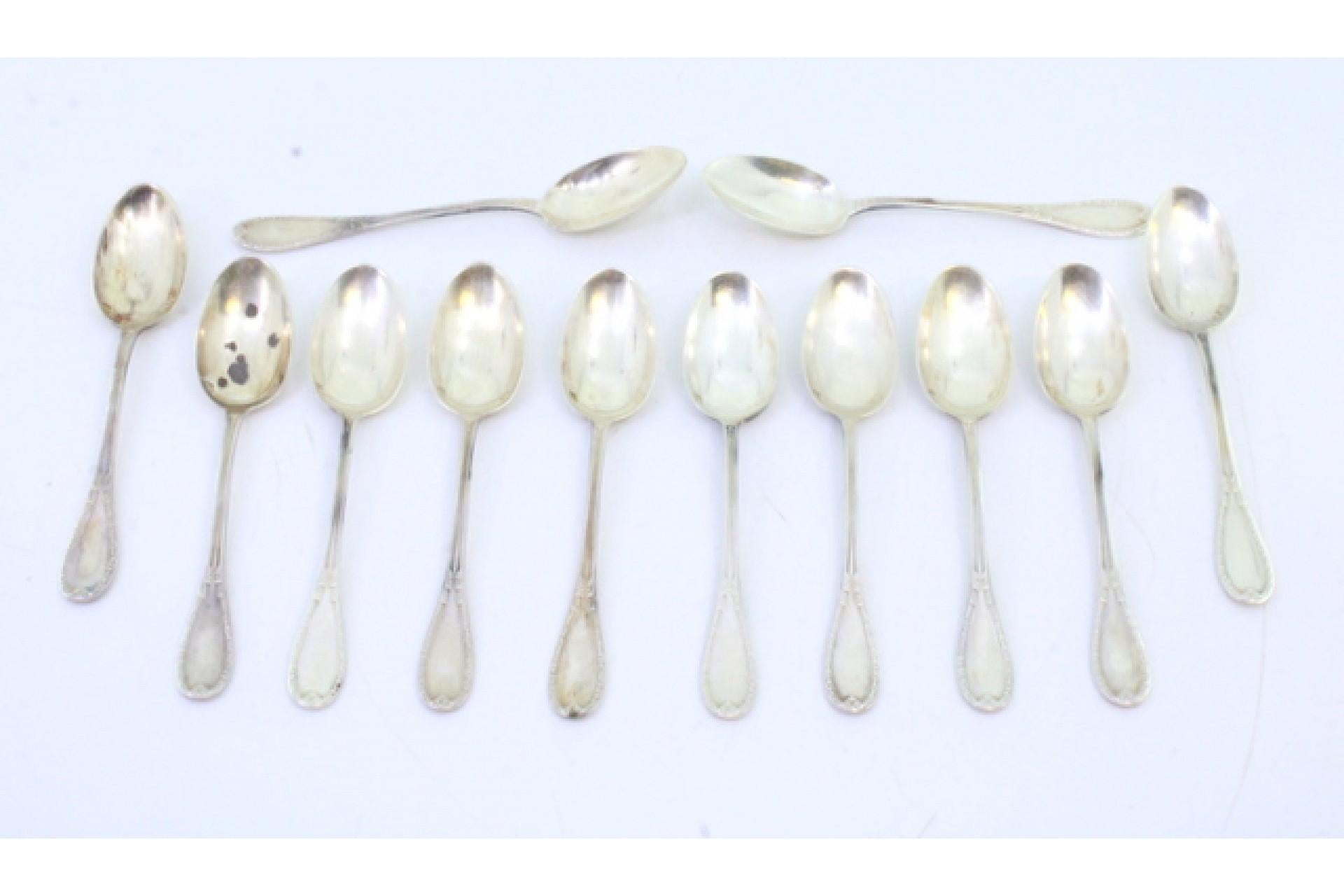 Description: Set of twelve silver teaspoons with grooved handles. Metal: Silver. Origin: French. Brand: Tête Minerve. Weight: 136.95 grams. Dimensions: 11cm x 2.2cm. Content: 950/1000. Assay Mark: Yes, since 1838. Additional information: Good