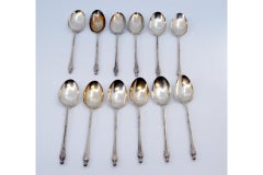 Set of twelve silver teaspoons with hexagonal gradient handles
