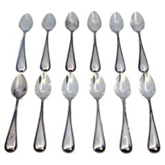 Set of twelve silver teaspoons with pearl handles