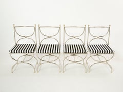 Ensemble de douze chaises Curule en acier, laiton et velours par Maison Jansen, années 1960