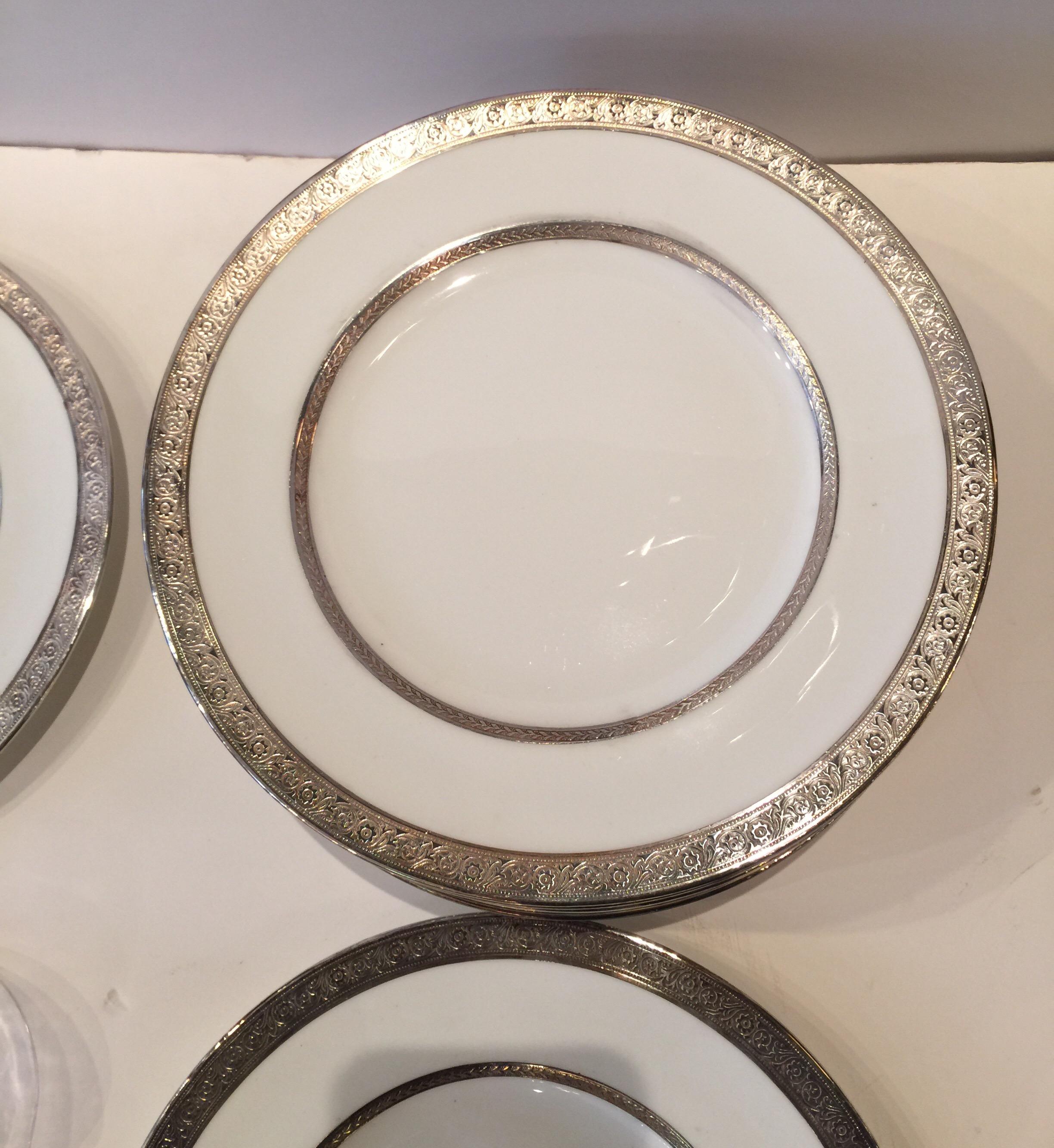 Mid-20th Century Set of Twelve Sterling Silver Overlay Dinner/Service Plates, England