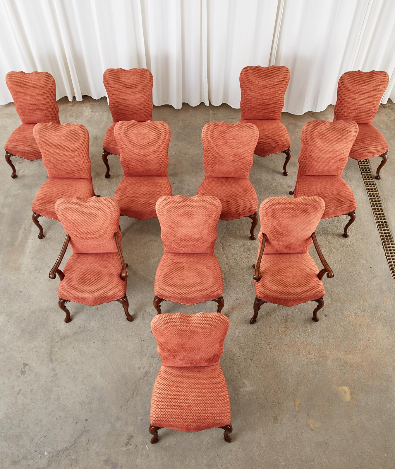 Grand set of twelve walnut dining chairs designed by Therien Studio, Los Angeles, CA. Known as the 