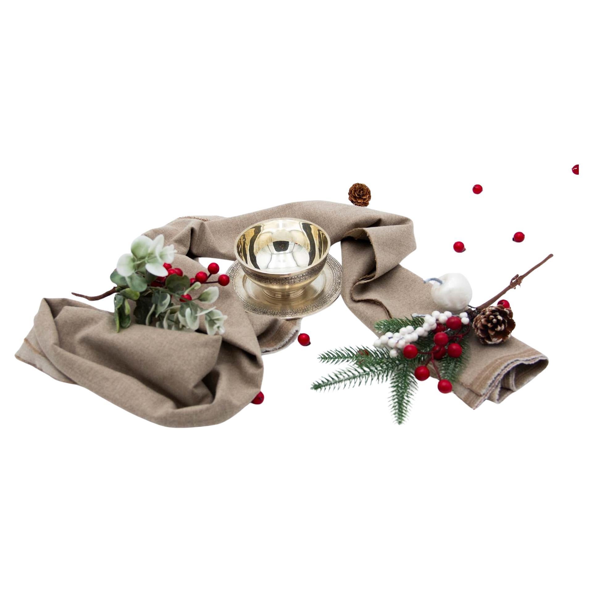 Set of twelve washbasins w/ silver saucers w/ engravings
surrounding friezes