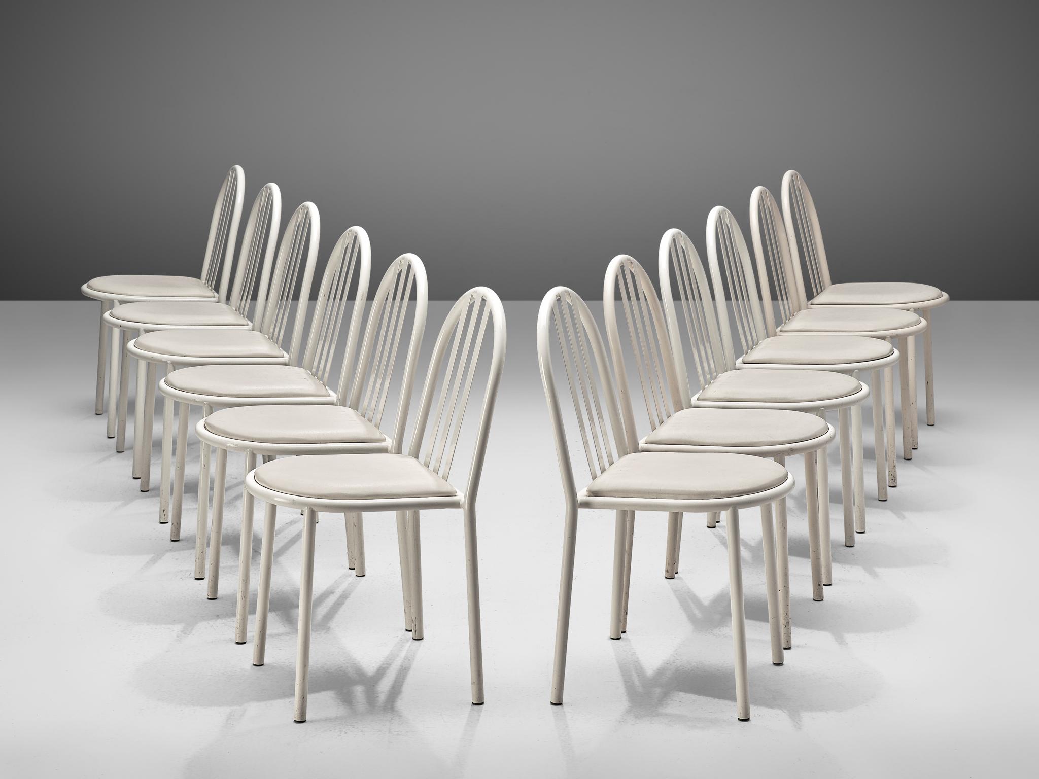Robert Mallet Stevens for Stevens designs, set of 12 dining chairs, lacquered metal and leatherette, France, design 1928, production later.

Set of white lacquered tubular chairs designed by the one of the masters of the Modern architecture;
