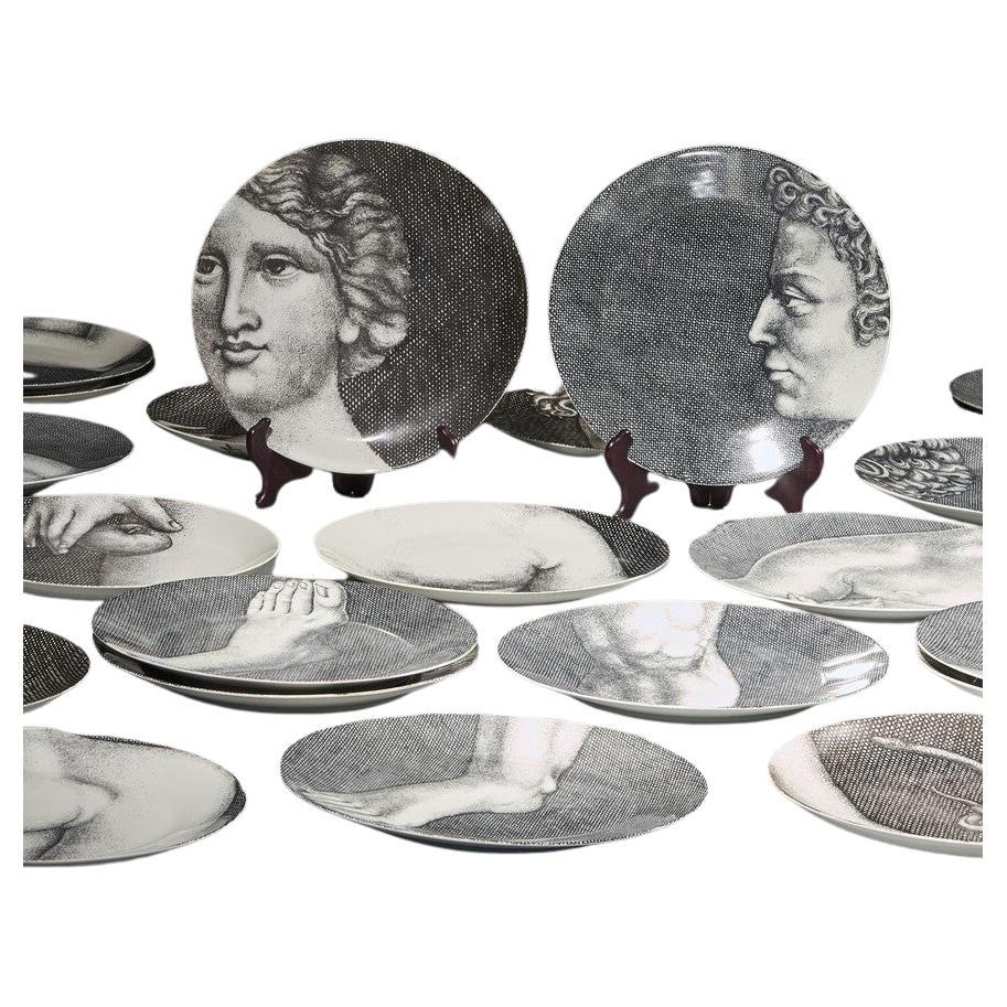 Set of Twenty Four Early Piero Fornasetti Adam and Eve Porcelain Plates For Sale