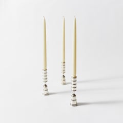 Set of Twenty Four Silver Plated Pilar Candlesticks by Dansk