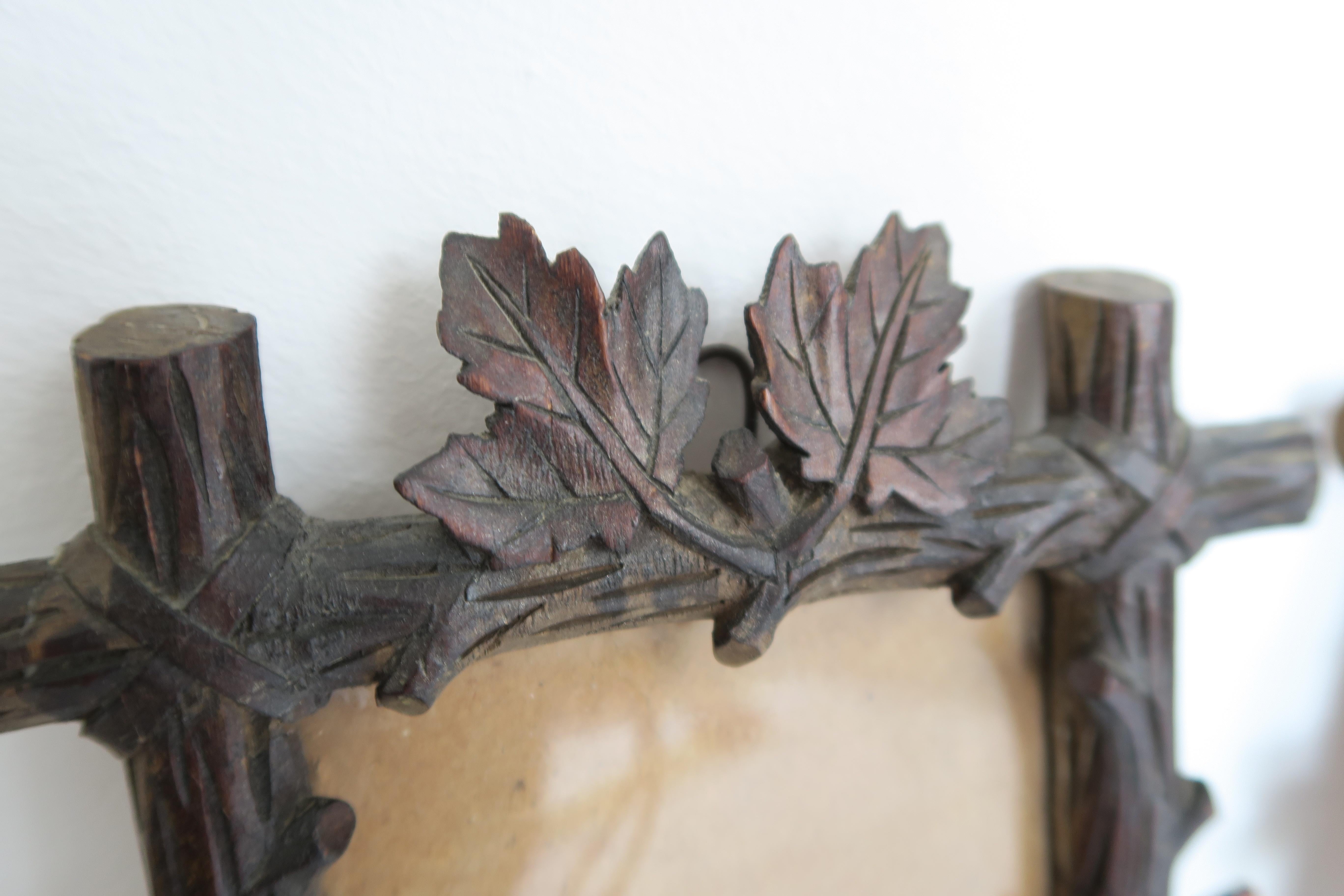 For sale is a set of two unique Blackforest wooden pictureframes. The Frames have been hand carved in the shape of branches and maple leaves. The come complete with glass, some cardboard back panels and little nails for fixture. The were