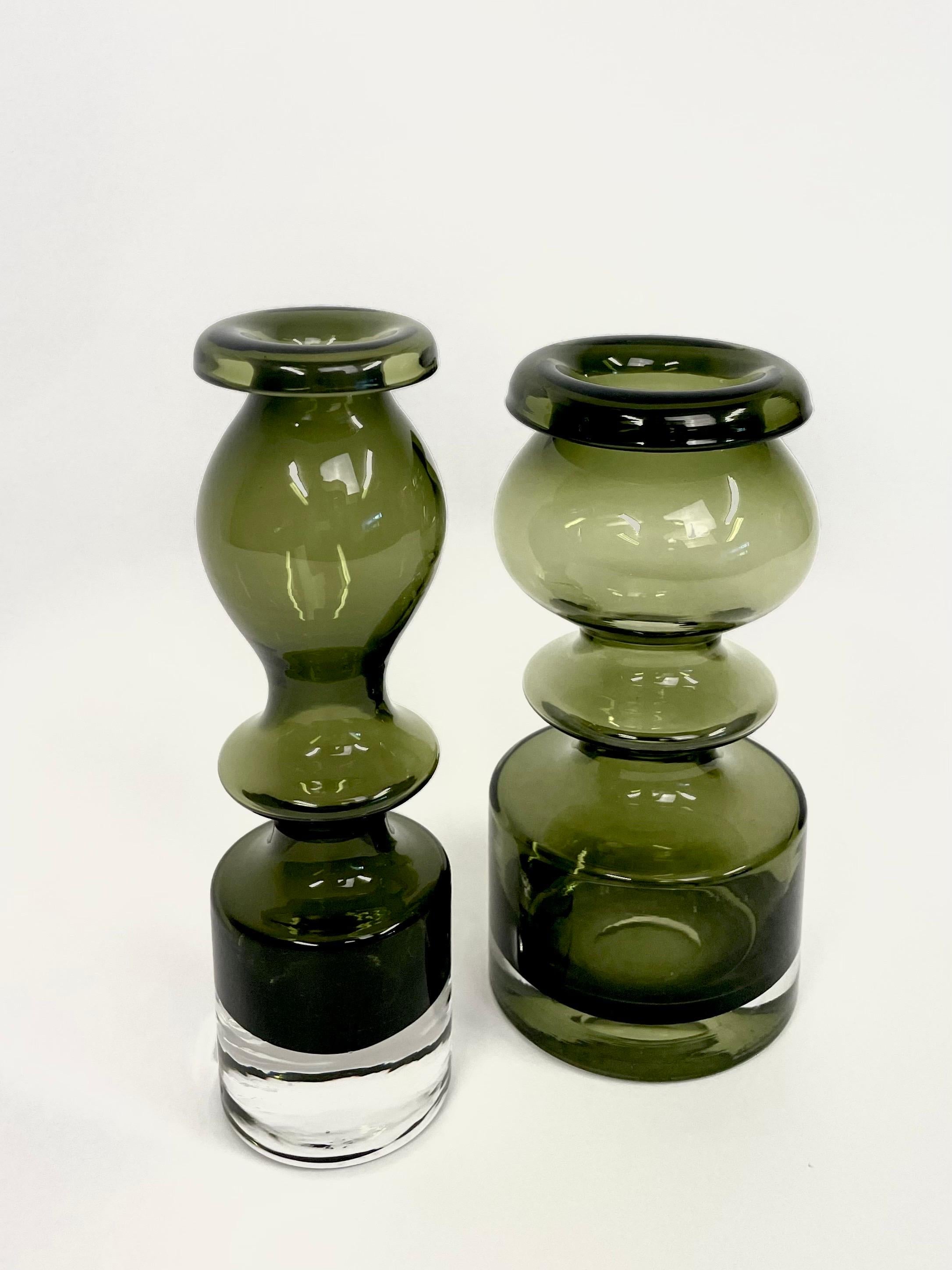 This is the Finnish set of two pieces by Nanny Still named Pompadour.
It comes with two pieces of the quiet rare color olive green. The two models, 1945 and 1405, of the Pompadour series are designed in an elegant shape. This particular model 1405