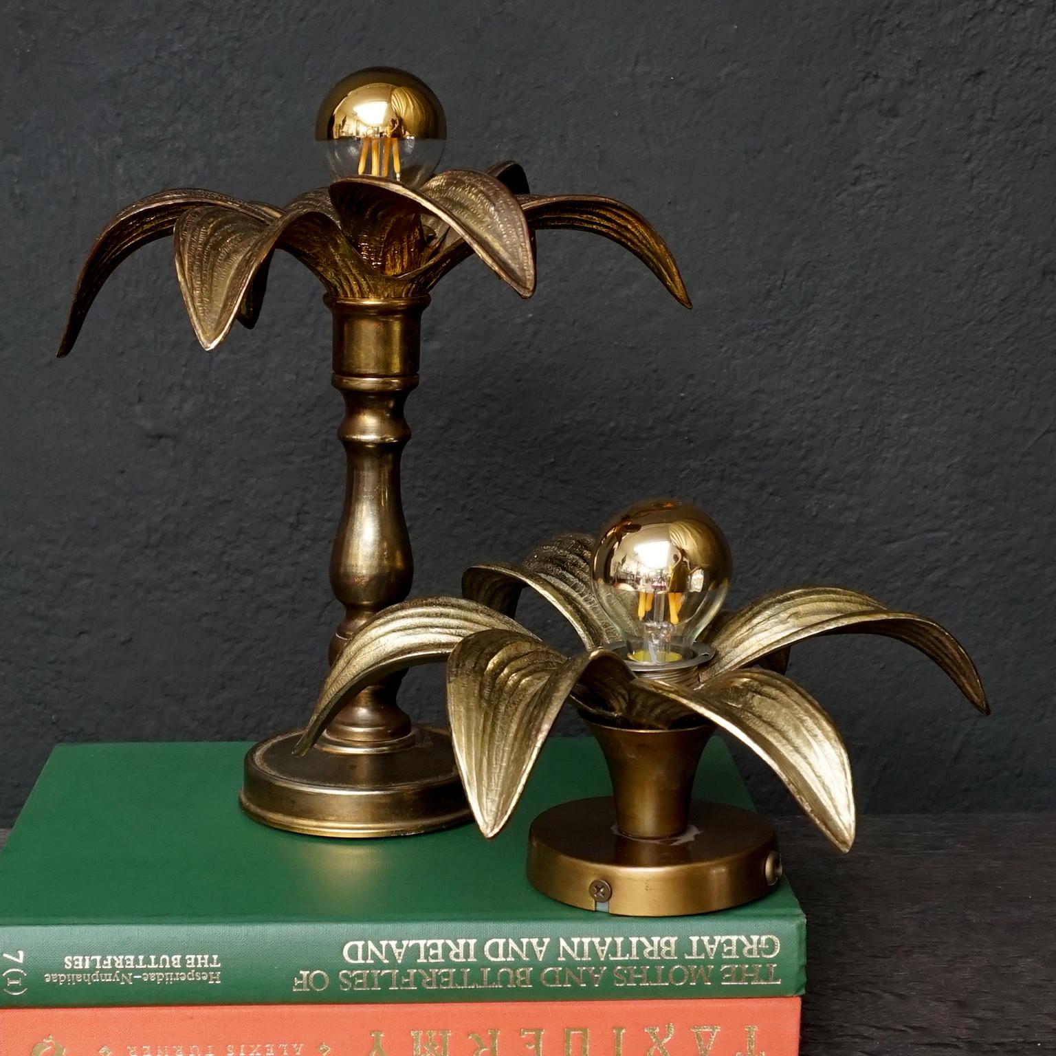 Vintage set flower Willy Daro for Massive lights, each shaped from leaves one connected to a wall plate which also can be placed on a flat surface, the other a table or desk light

As you can see this set of golden flowers have all the glamour of