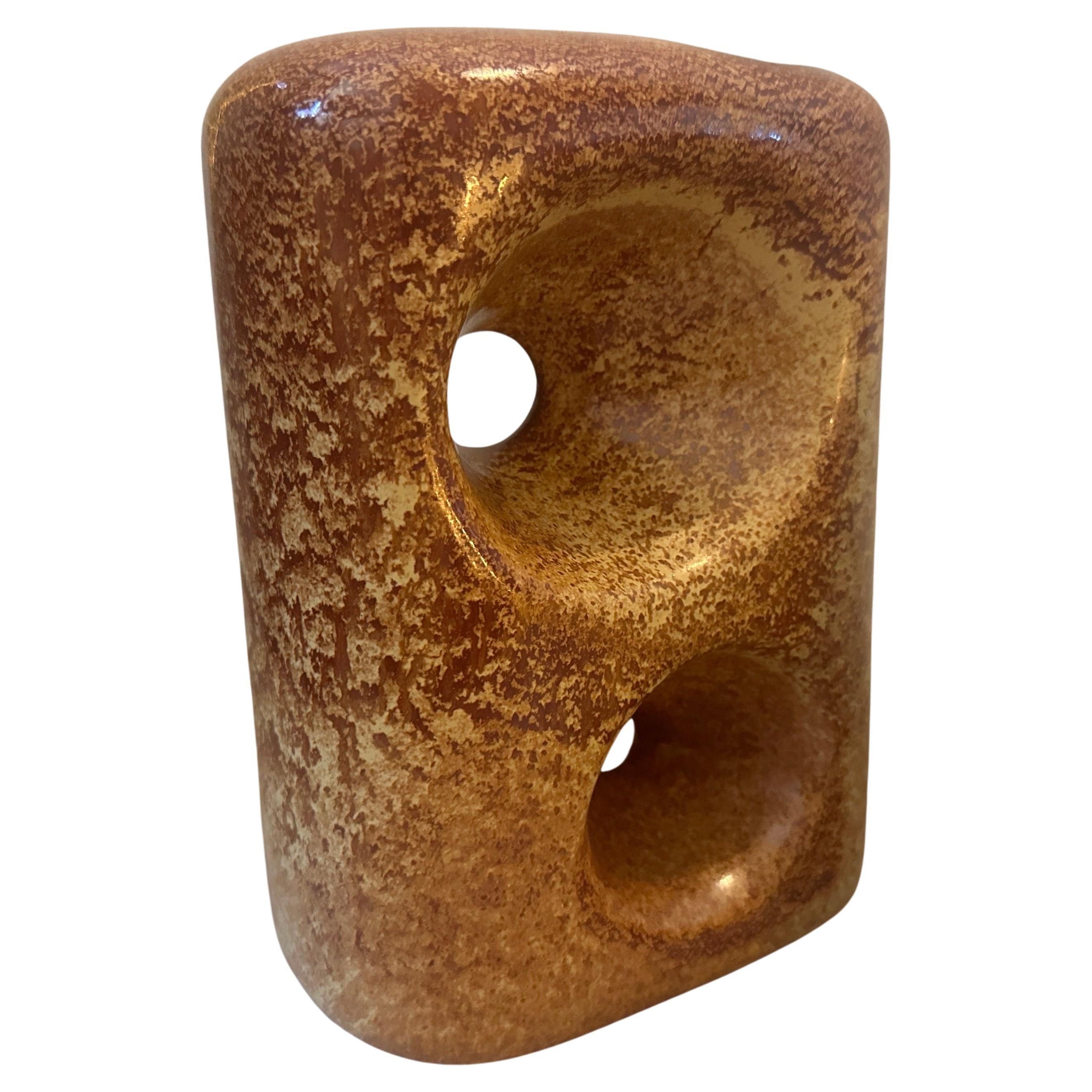 Two iconic brown and beige ceramic vases designed and manufactured in Italy by Bertoncello in the Seventies, they embody the design characteristics of the period, showcasing a blend of modernism, earthy tones, and Italian craftsmanship.The height of