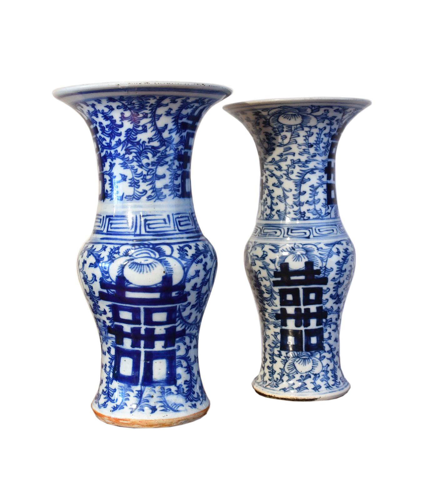 A beautiful set of two Chinese porcelain gu-form vases with hand painted cobalt blue decoration of 