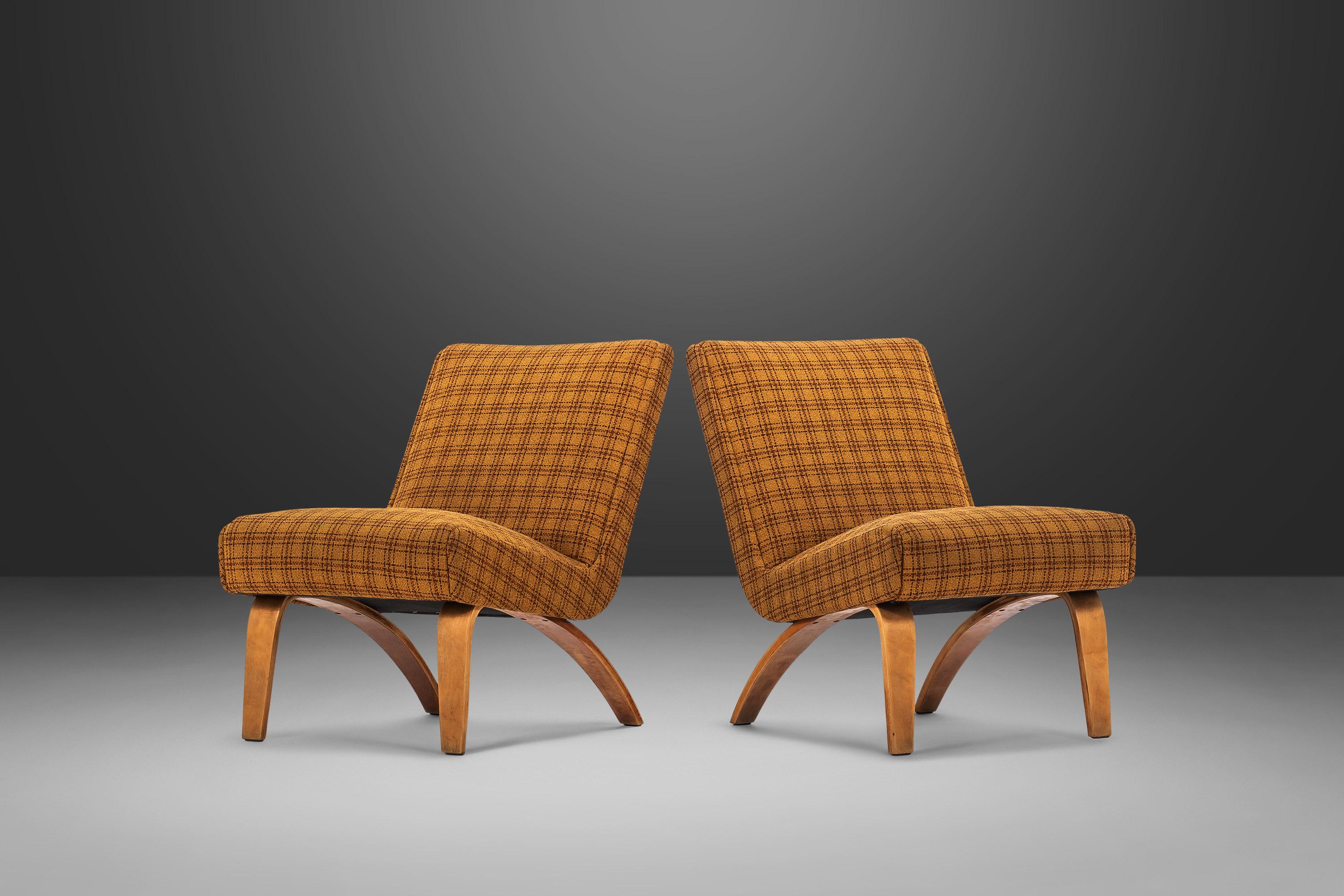 Comfort. Vintage fabric. Captivating bentwood legs. These two slipper chairs are the perfect addition to any space needing a pop of color and/or a minimal footprint. The original yellow plaid upholstery gives these splendid chairs tons of character