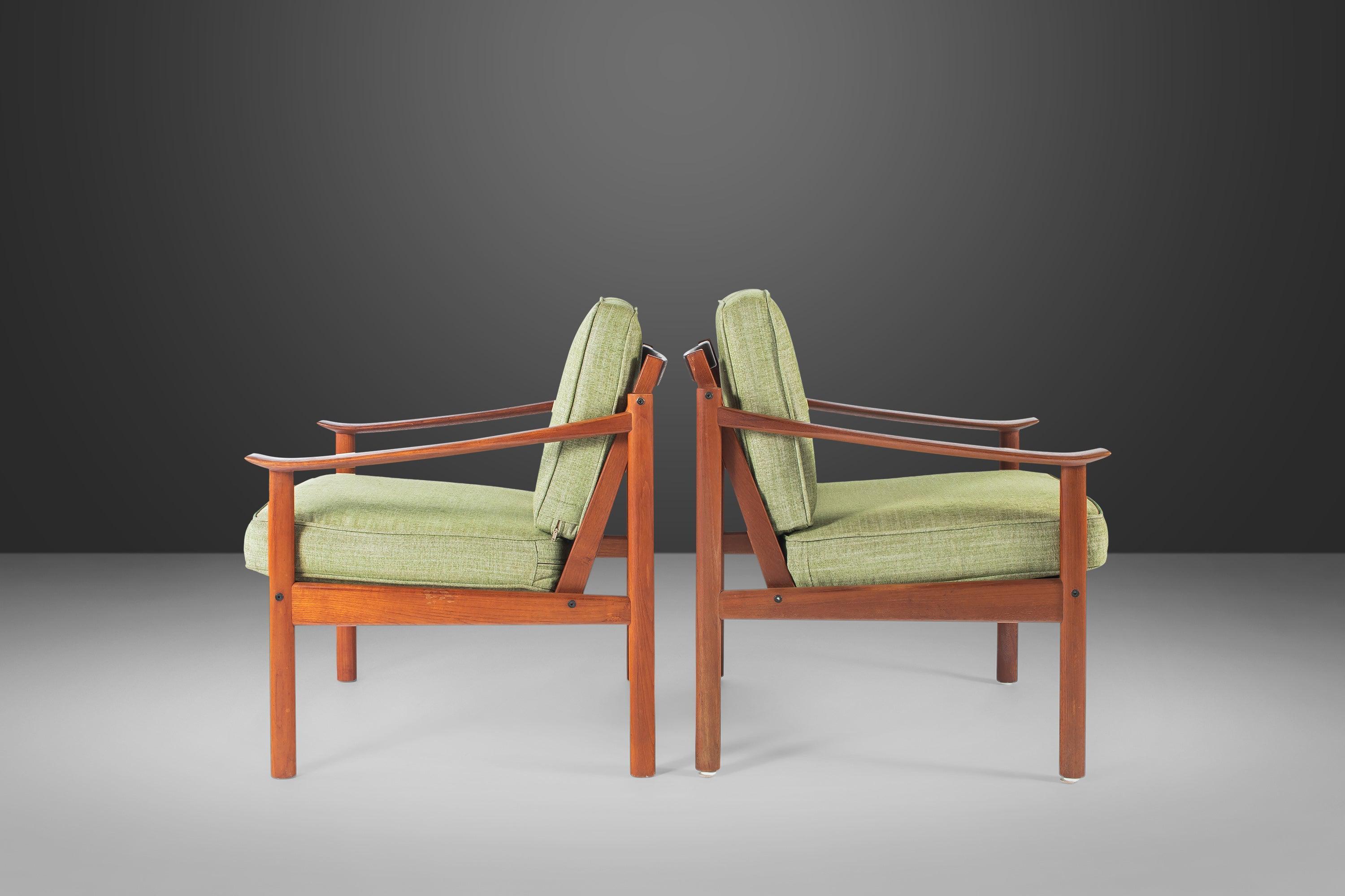 As comfortable as they are aesthetically captivating this ultra-rare set of lounge chairs by Peter Hvidt & Orla Mølgaard for Soborg Mobelfabrik are the epitome of functional art. With expertly sculpted arms cut out of of solid teak with exceptional