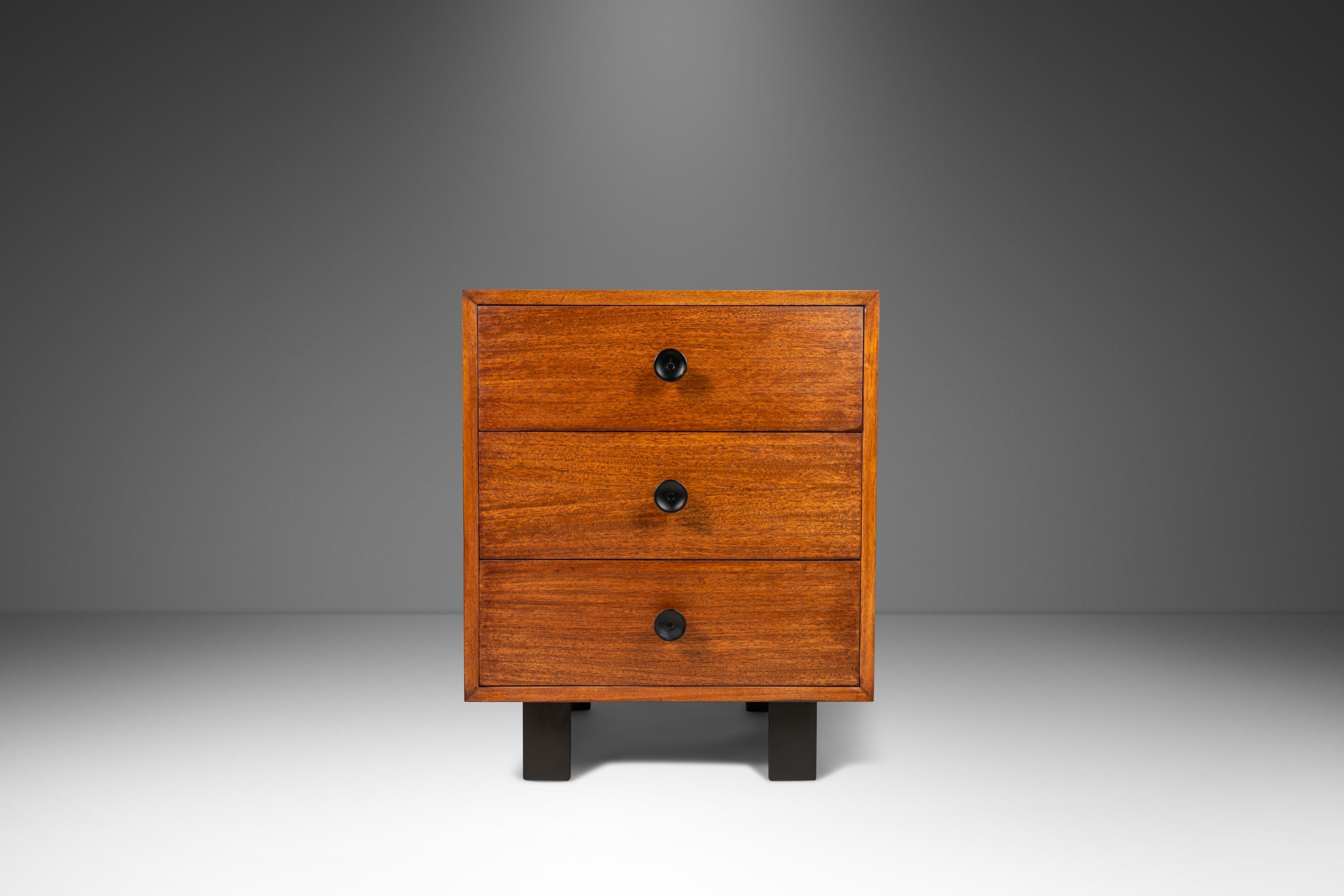 As rare as they are architecturally captivating this exceptional set of end tables has recently undergone a comprehensive and transformative restoration process. The mix of solid and veneered European Walnut has been completely refinished and