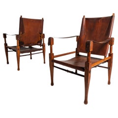 Satz von zwei „2“ Leder-Safari-Stühlen von Wilhelm Kienzle für Wohnbedarf, ca. 1950er Jahre
