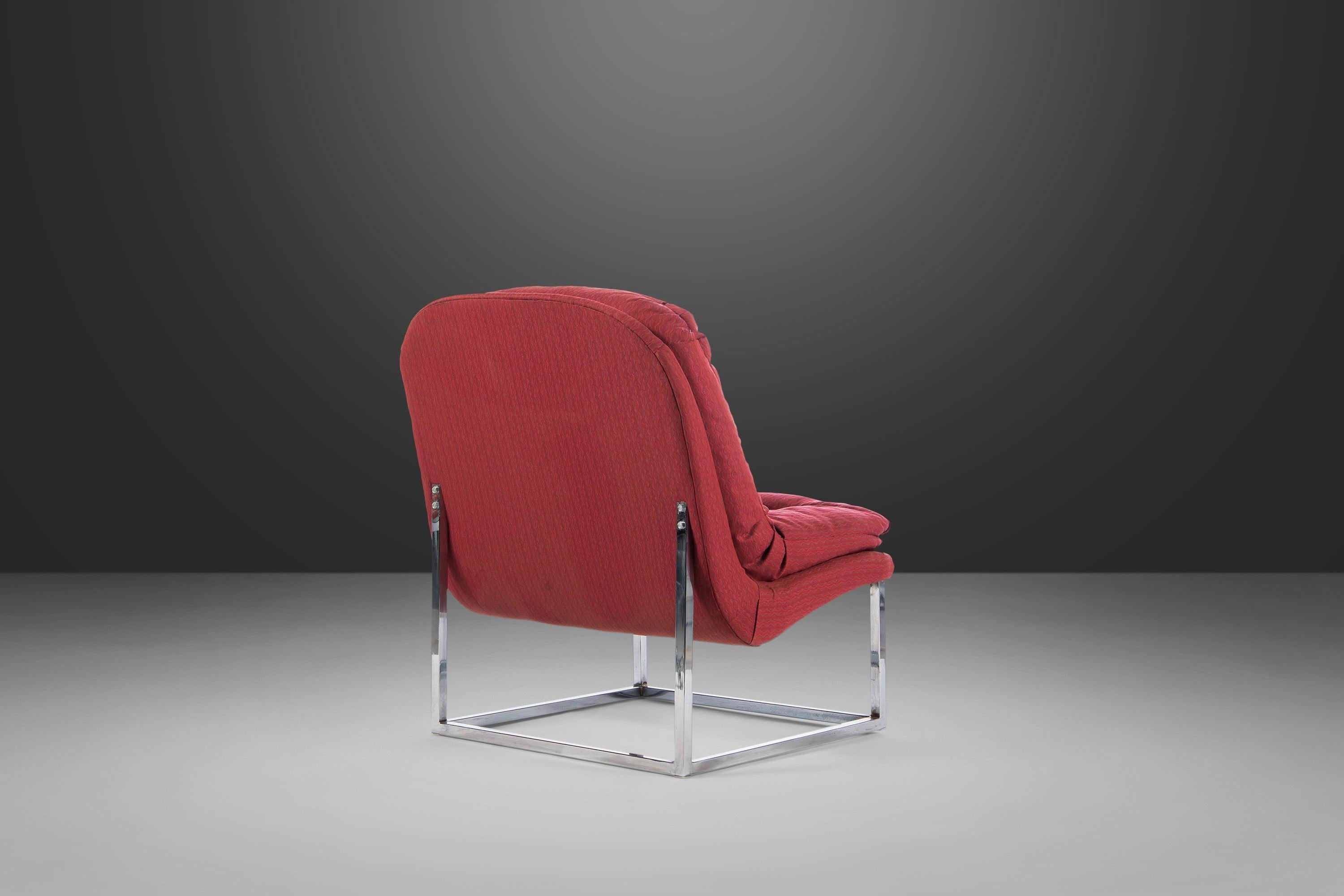 Perfect for a myriad of design pallets these lovely scoop chairs are both playful and bold. With solid chrome frames offset by the lovely raspberry upholstery these fashionable accent chairs are sure to make a statement in any space they inhabit and