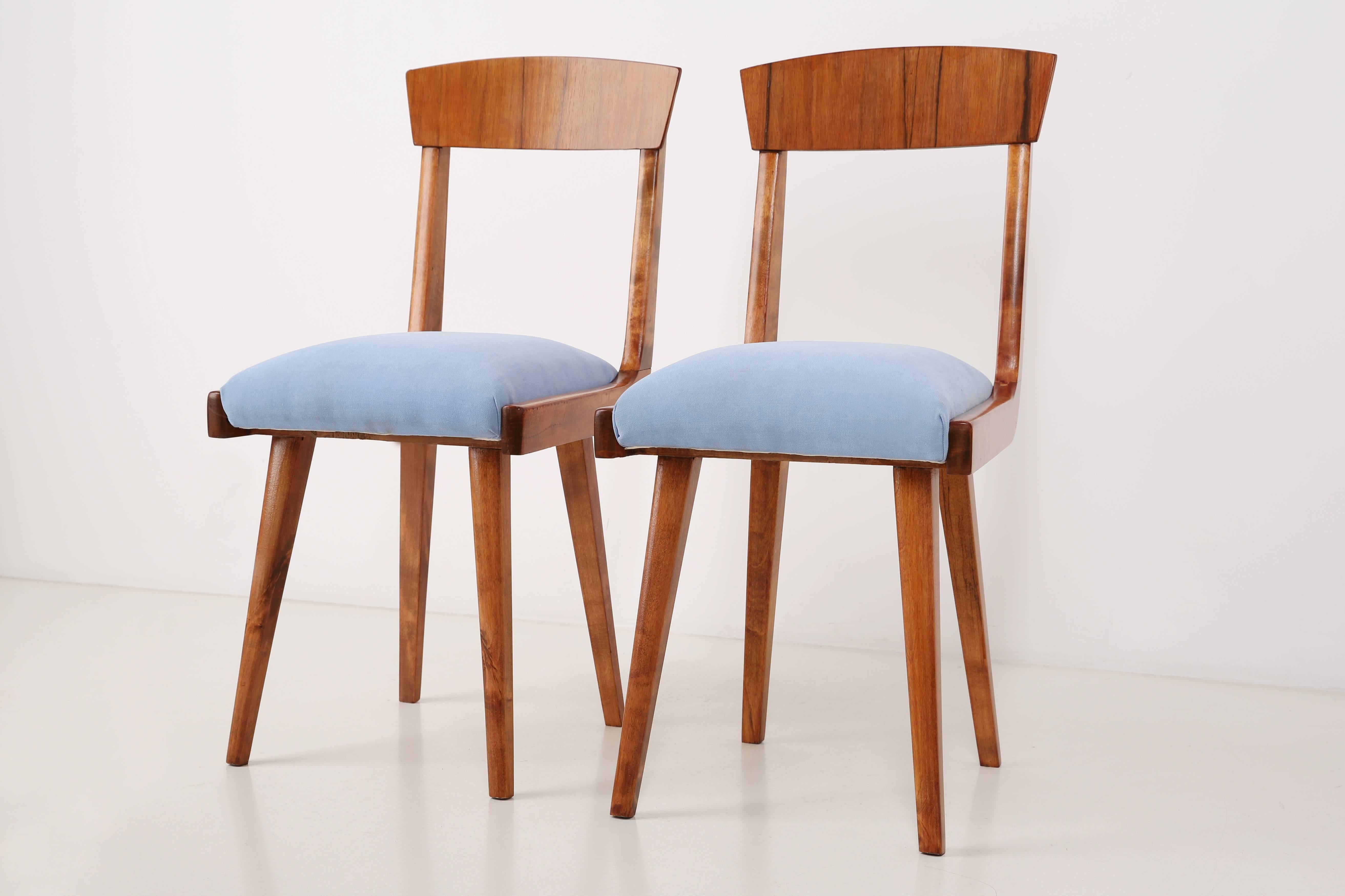 Chairs designed by prof. Rajmund Halas. They have been made of beechwood. They have undergone a complete upholstery renovation, the woodwork has been refreshed. Seats were dressed in light blue fabric. They are stable and very shapely. Chairs were