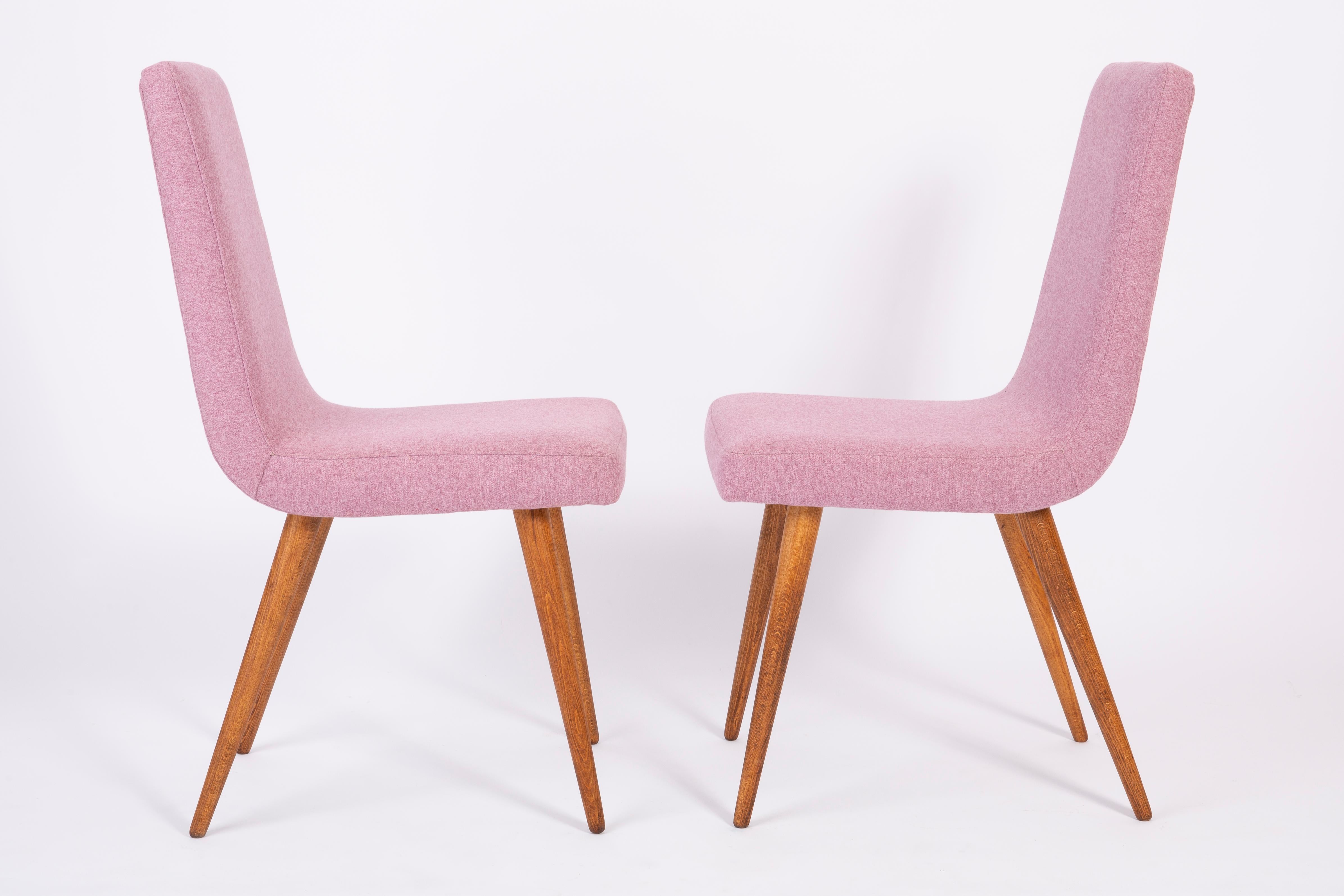 Chairs designed by Prof. Rajmund Halas. They have been made of beechwood. They have undergone a complete upholstery renovation, the woodwork has been cleaned and refreshed. We used matte varnish. Seats and backs were dressed in a pink mélange (color