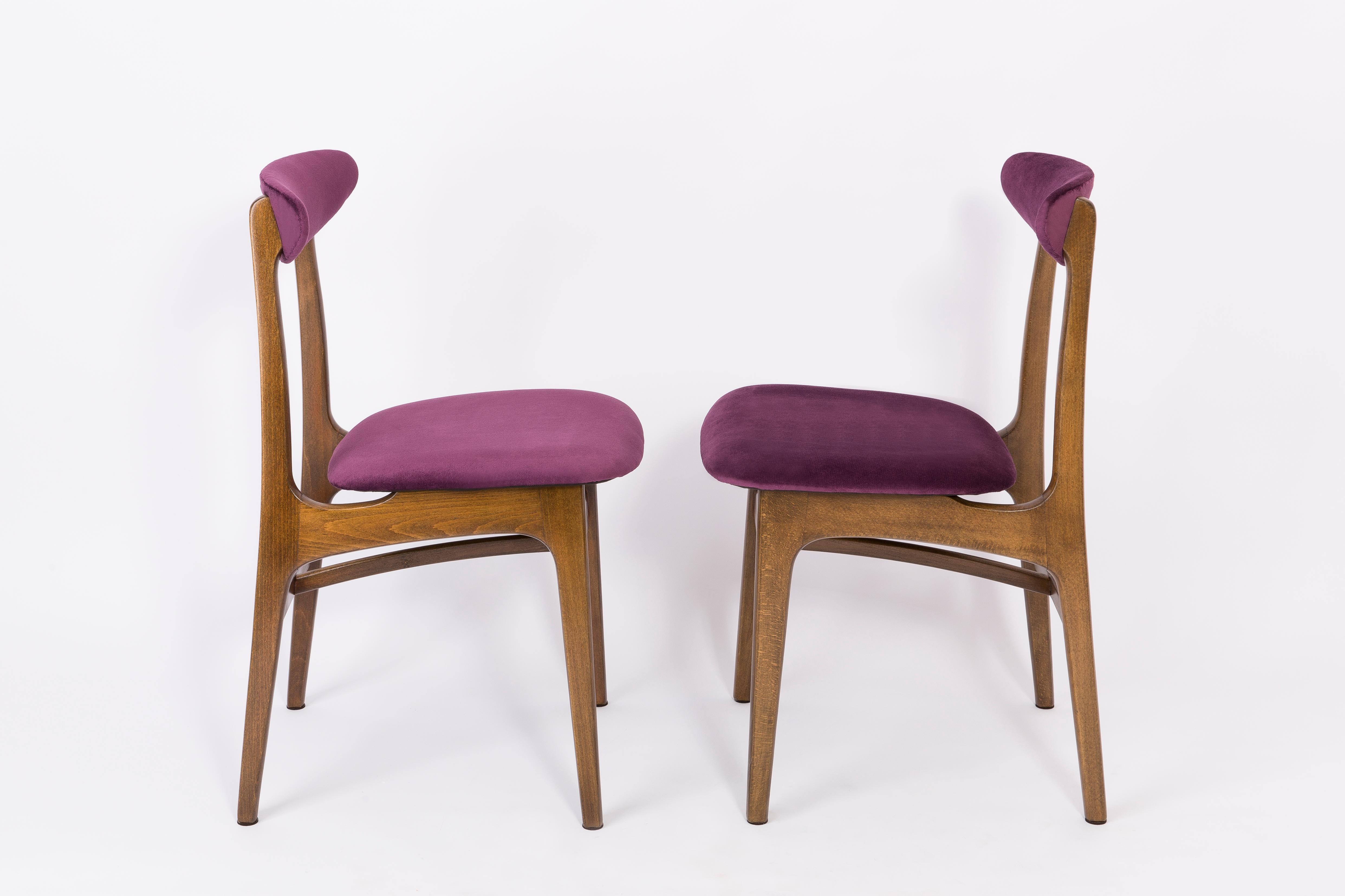 Chairs designed by Prof. Rajmund Halas. They have been made of beechwood. They have undergone a complete upholstery renovation, the woodwork has been refreshed. Seats and backs were dressed in a plum (color 969), durable and pleasant to the touch