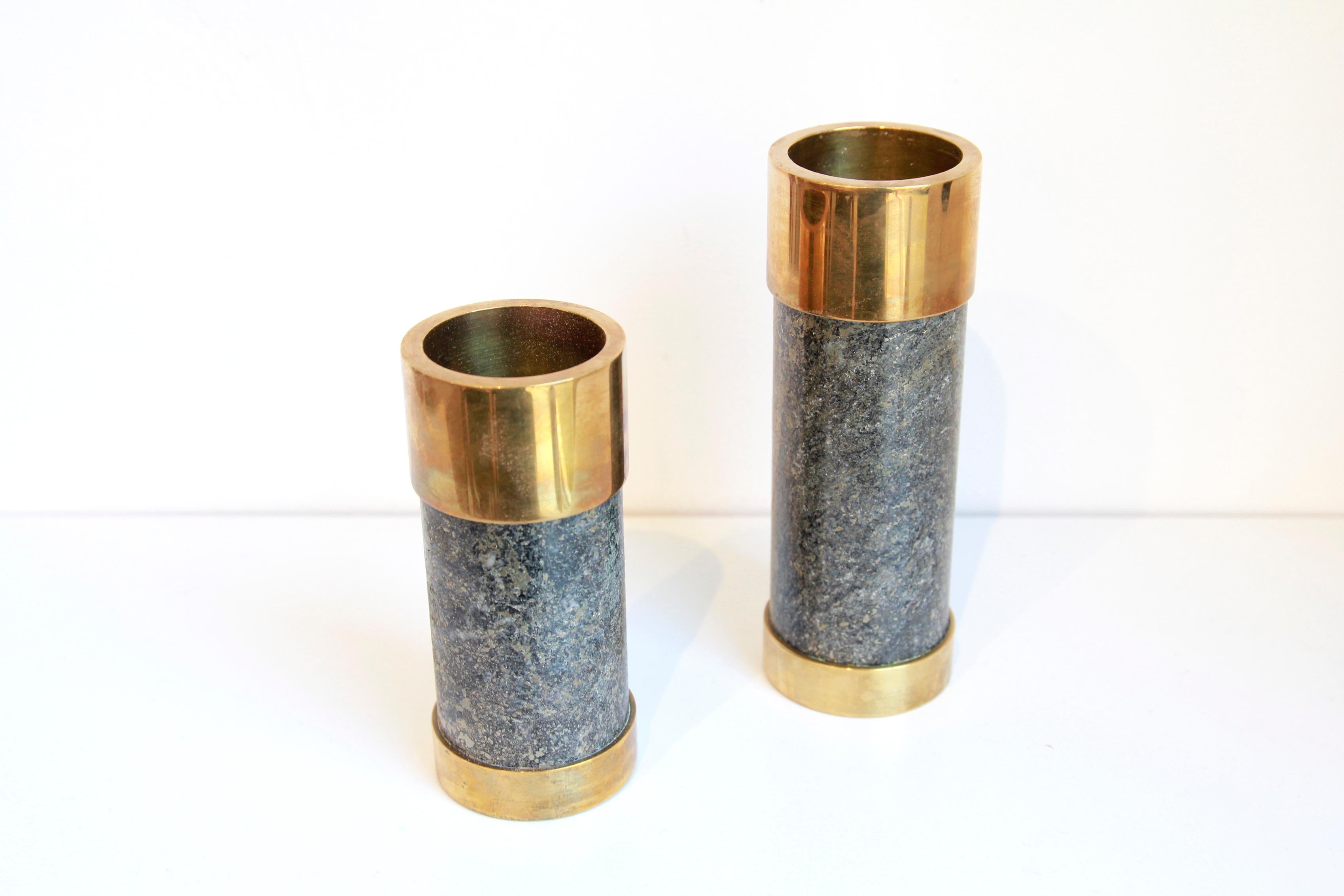 Two tealight holders made by Saulo AS in Sulitjelma, Norway. A Norwegian product from the 70s made of beautifully polished stone and brass edges on the top and bottom. The polished stone is ore from Sulitjelma. Much of this ore comes from the