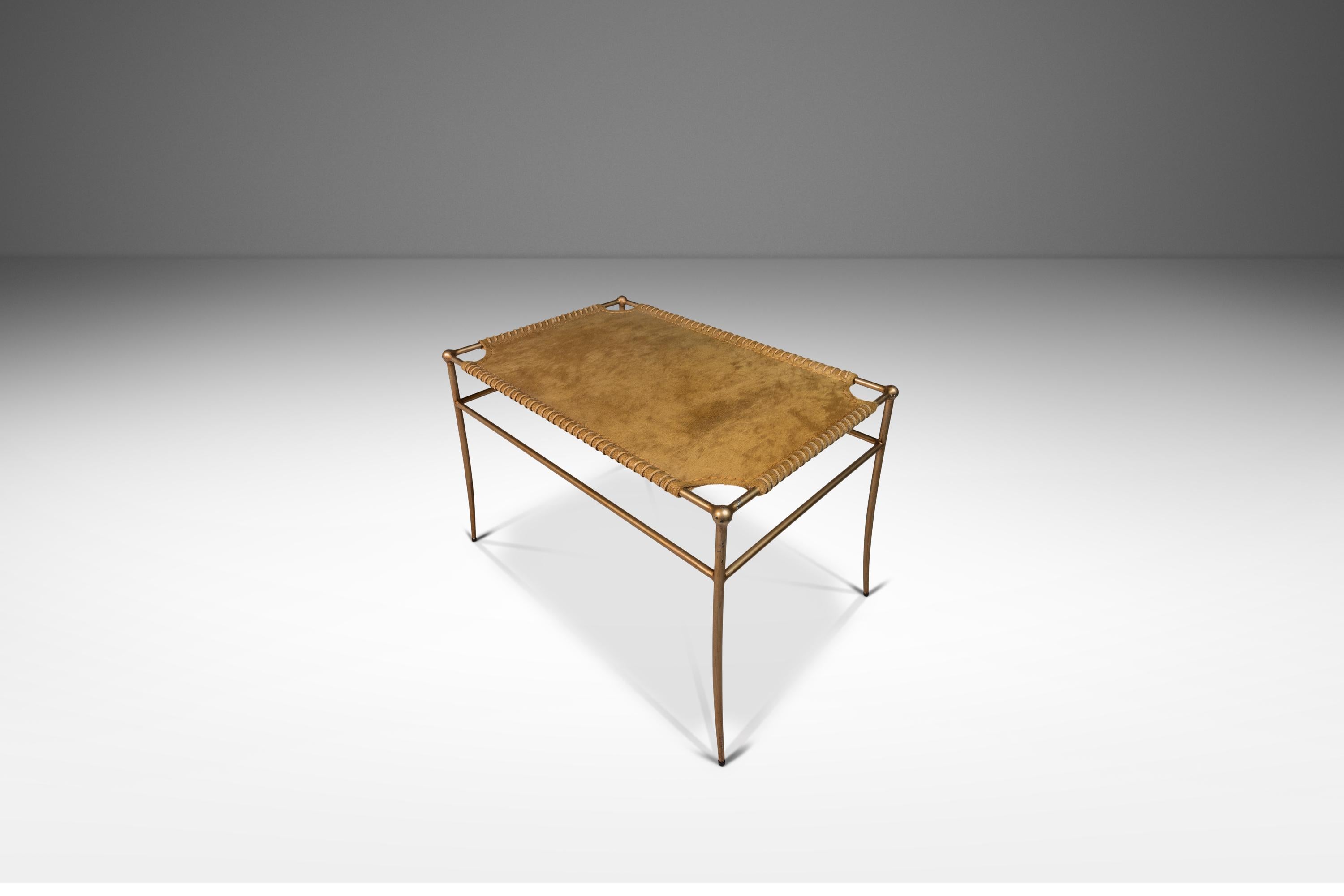  Introducing an ultra-stylish set of accent benches that are petite in stature but grand in stance and materials used. Constructed from a solid metal frames with French-styled, cantilevered feet that add a sense of airiness and hand-wrapped in