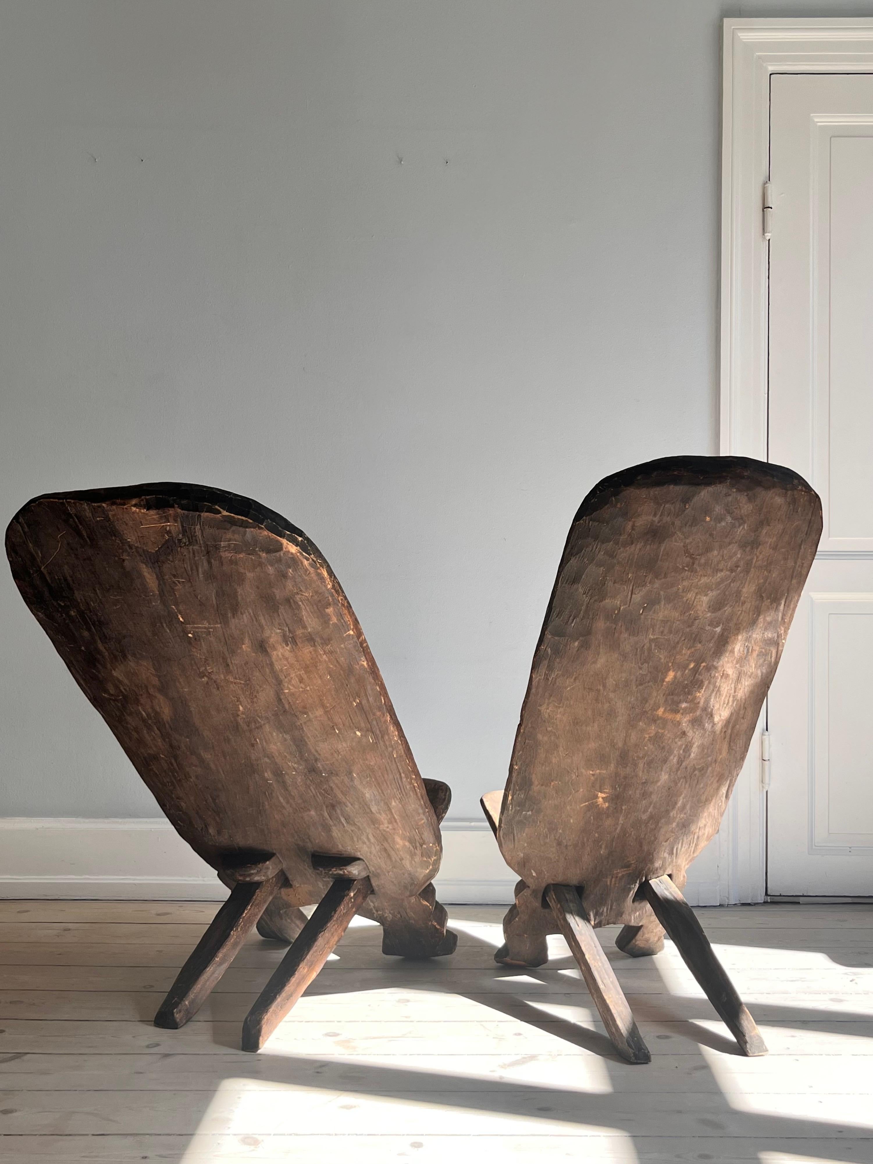 Set of two african 1960s scissor chairs with decorations 9