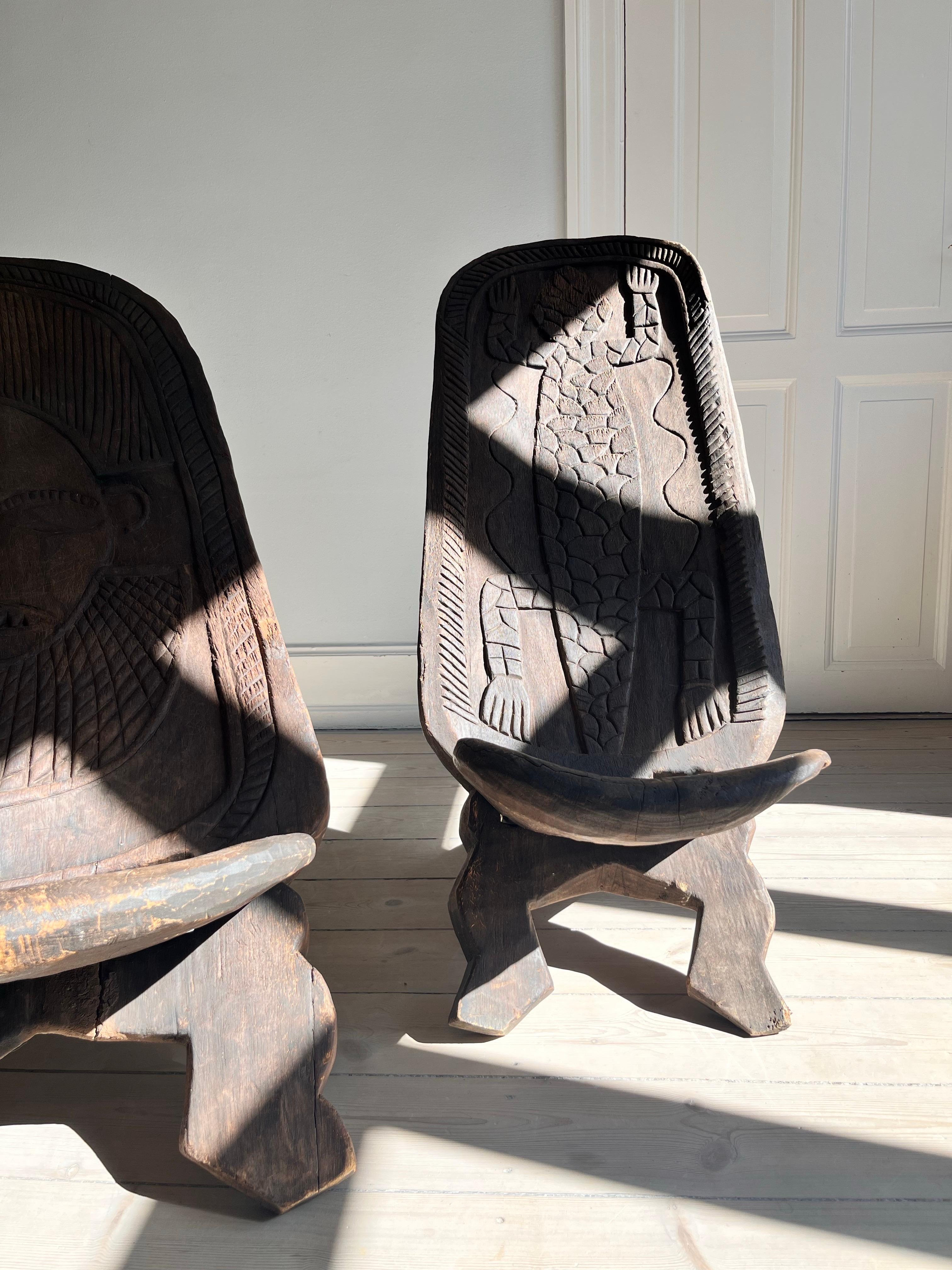 Set of two african 1960s scissor chairs with decorations 11