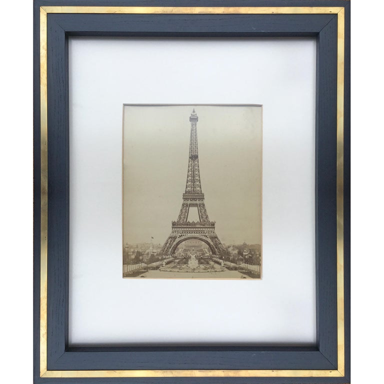 Set of two albumen prints featuring “Big bell in Mumbalay, Burma” and “Eifel Tower in Paris, France”. Original photographs produced using the traditional Albumen method by the British photographer Charles Scowen between 1880s and 1890s. Sold