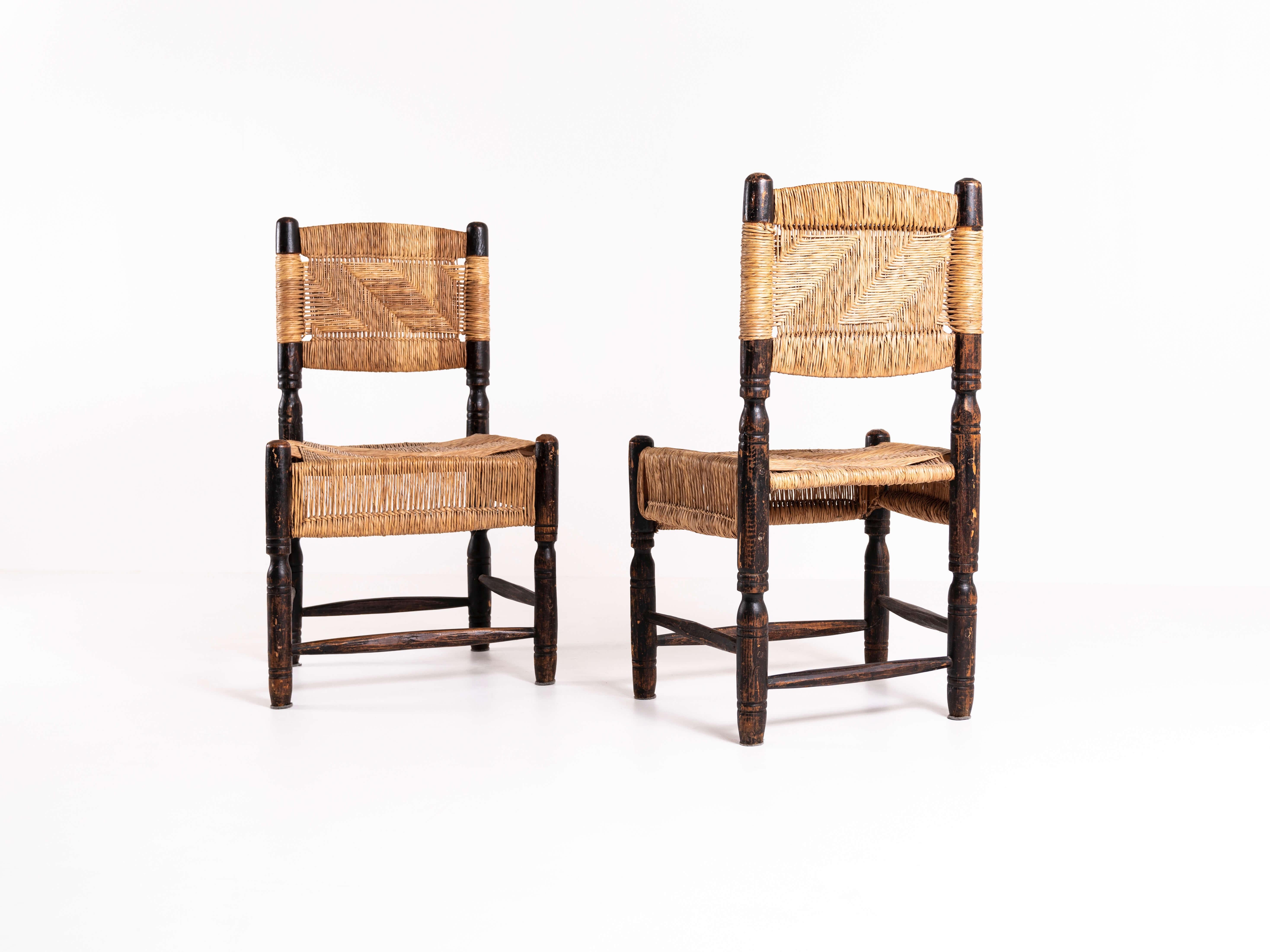 Interesting American woven chairs from ca 1940s. These chairs have the most amazing patina and we really did not want to do too much to them. They look a bit Spanish or Mexican with the robust wood and woven seats. Except for the patina, the chairs