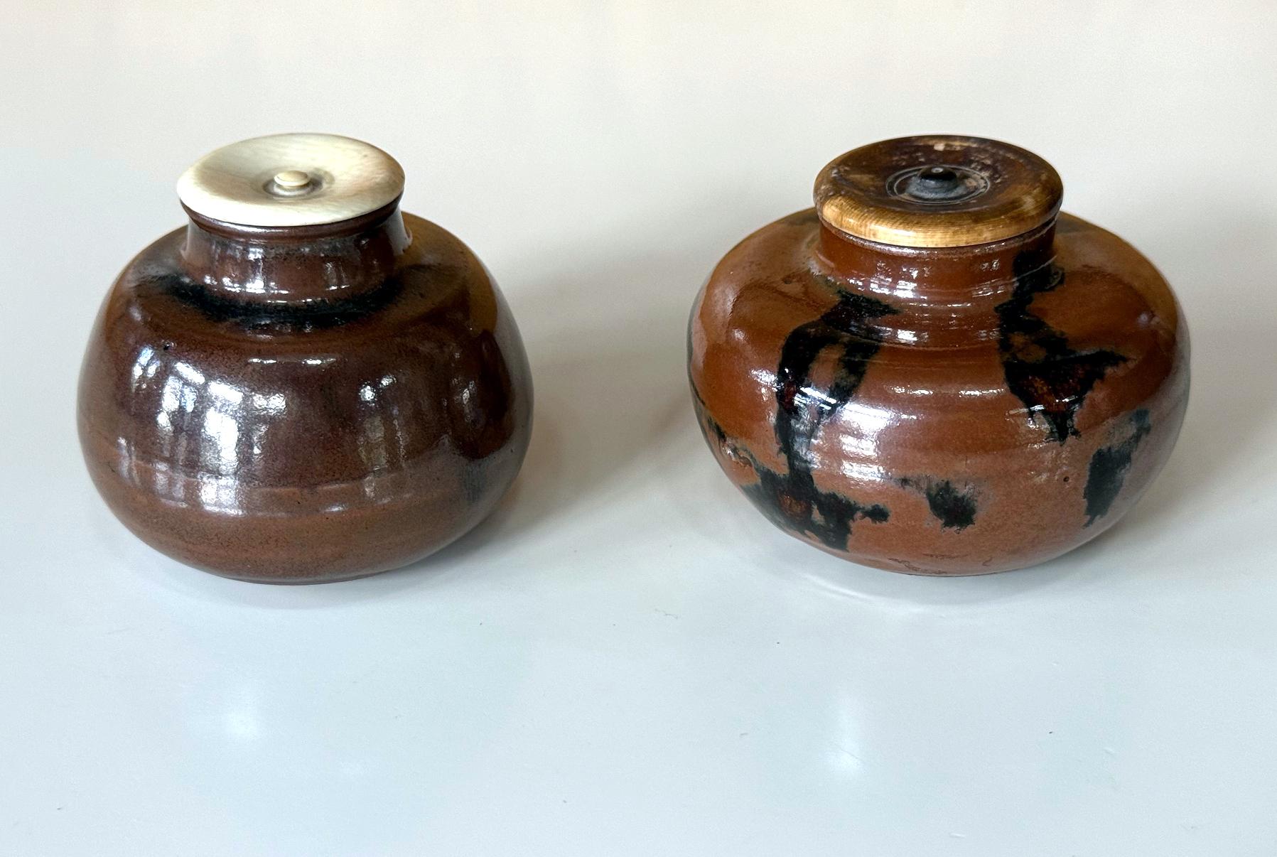 A collection of two ceramic chaires (Tea caddies) of Ko-seto ware type from Edo period Japan circa 18th to early 19th century. This type of small jar was made of stoneware in old Seto kilns in Gifu prefecture. Its specific form with raised shoulder