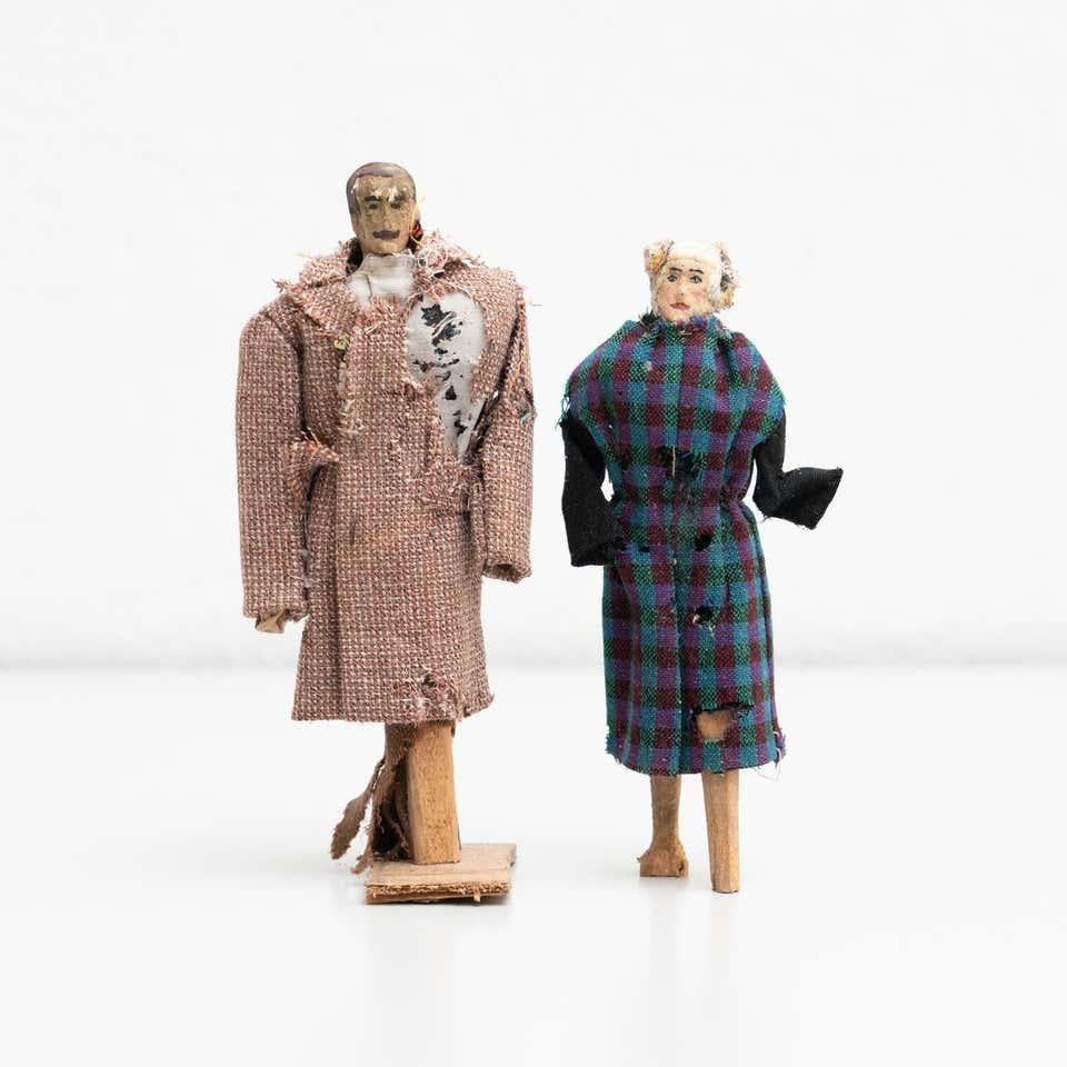 Antique early 20th century pair of hand painted rag dolls.   

Manufactured circa 1920 in Spain.  

In original condition, with minor wear consistent with age and use, preserving a beautiful patina. 

Fabric is broken on some places due to its age. 