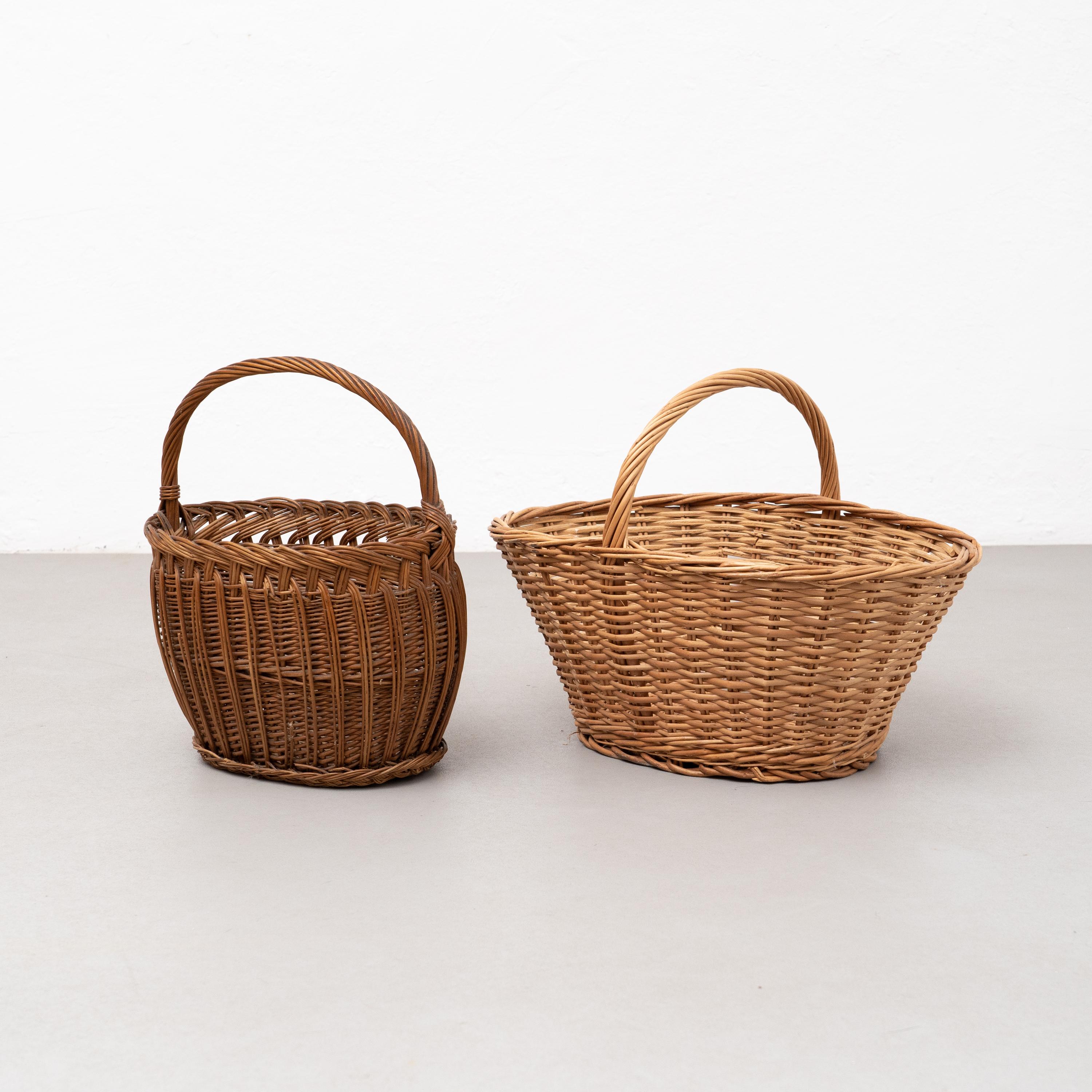 Set of two antique wicker basket.

By unknown artist, circa 1970.

In original condition, with some visible signs of previous use and age, preserving a beautiful patina.

Materials:
Wicker.
 