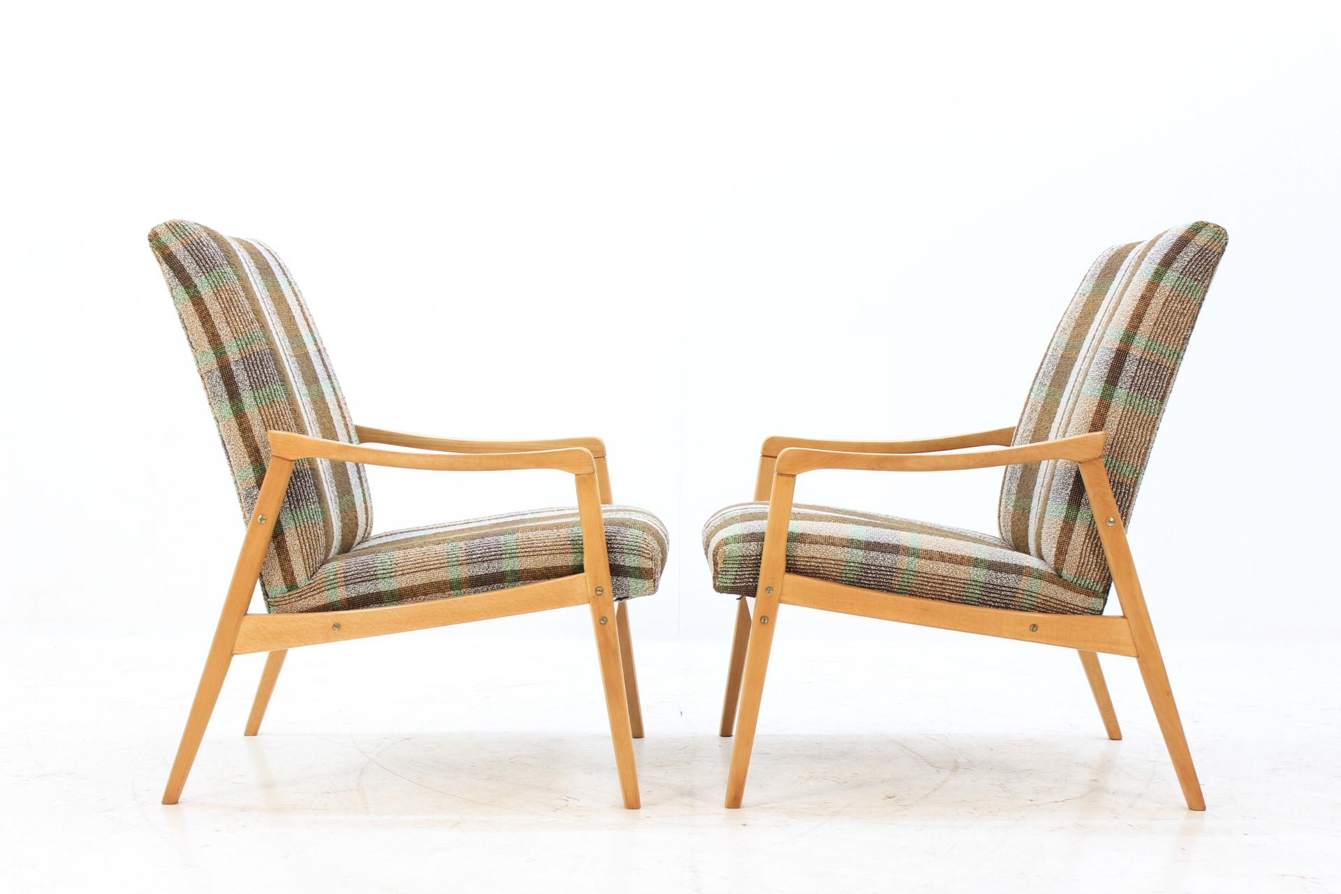 The items made of oak wood and original upholstery. Chairs made in Czechoslovakia. Partly restored.