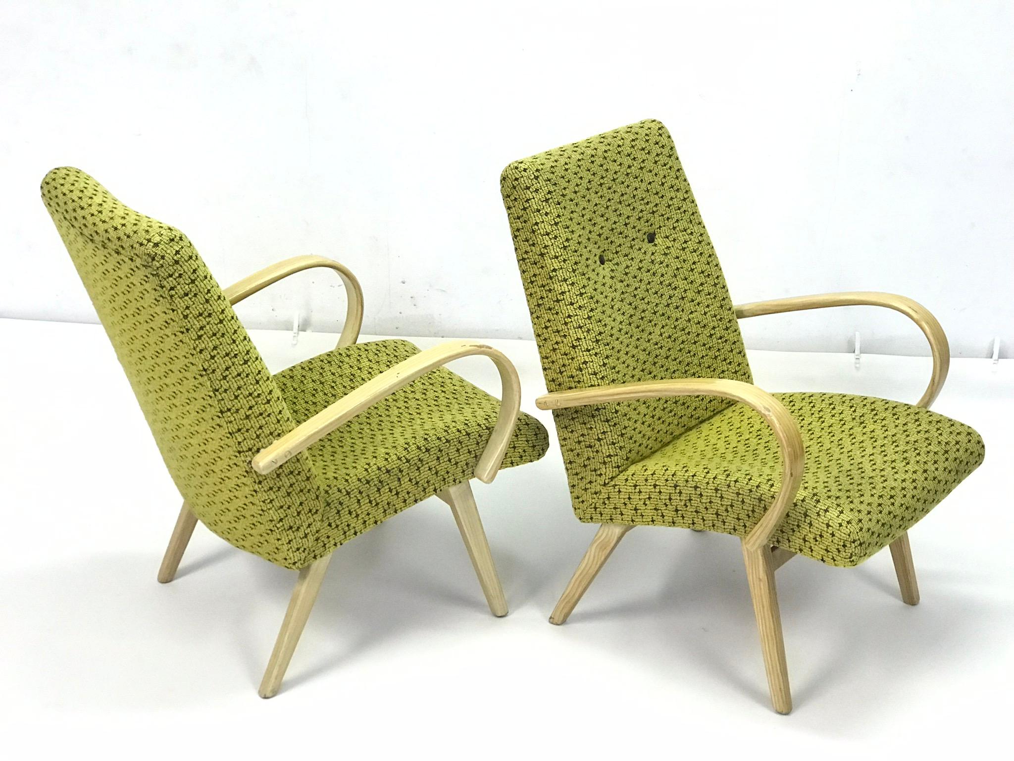 The armchairs designed by J. Halabala for connecting UP - factories. These ones have as original fabric as original wood. The armchairs have gentle scratches, the fabric is very nice. They are immediately usable.